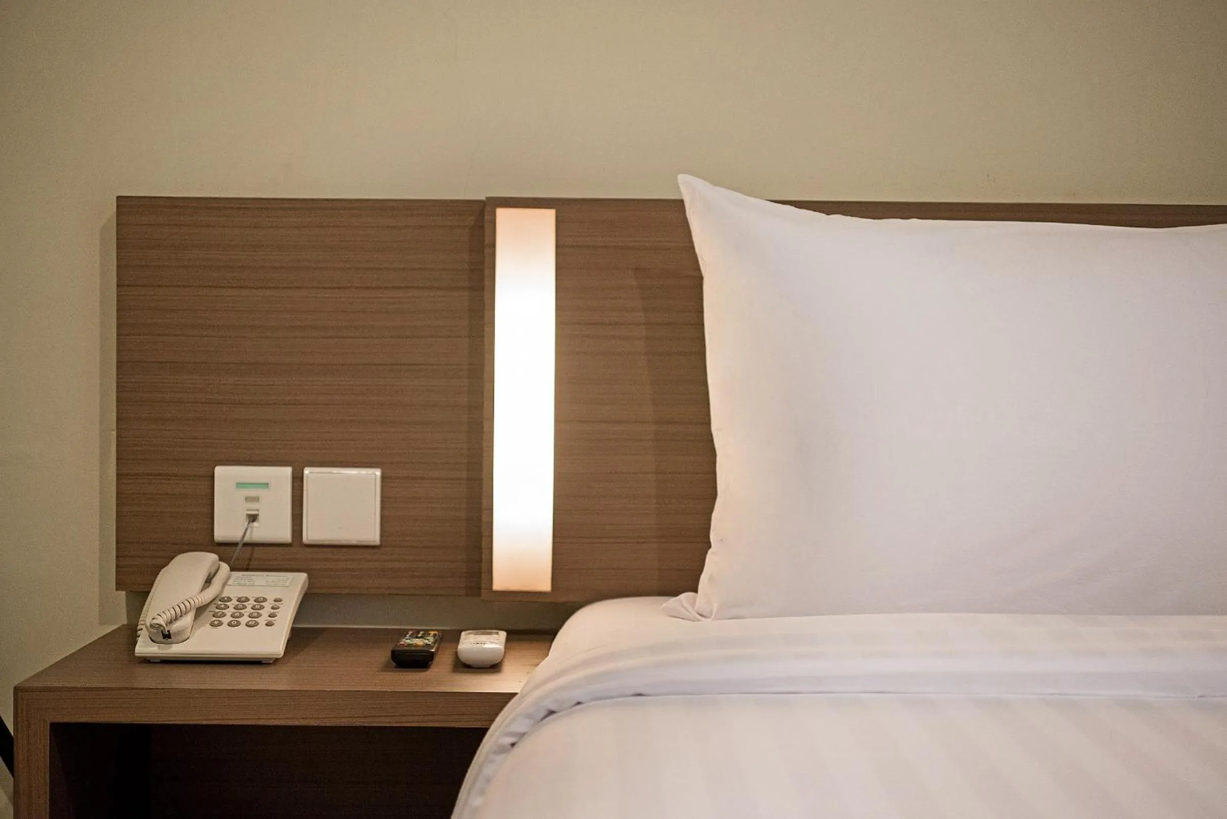 Bed in Whiz Prime Hotel Darmo Harapan Surabaya