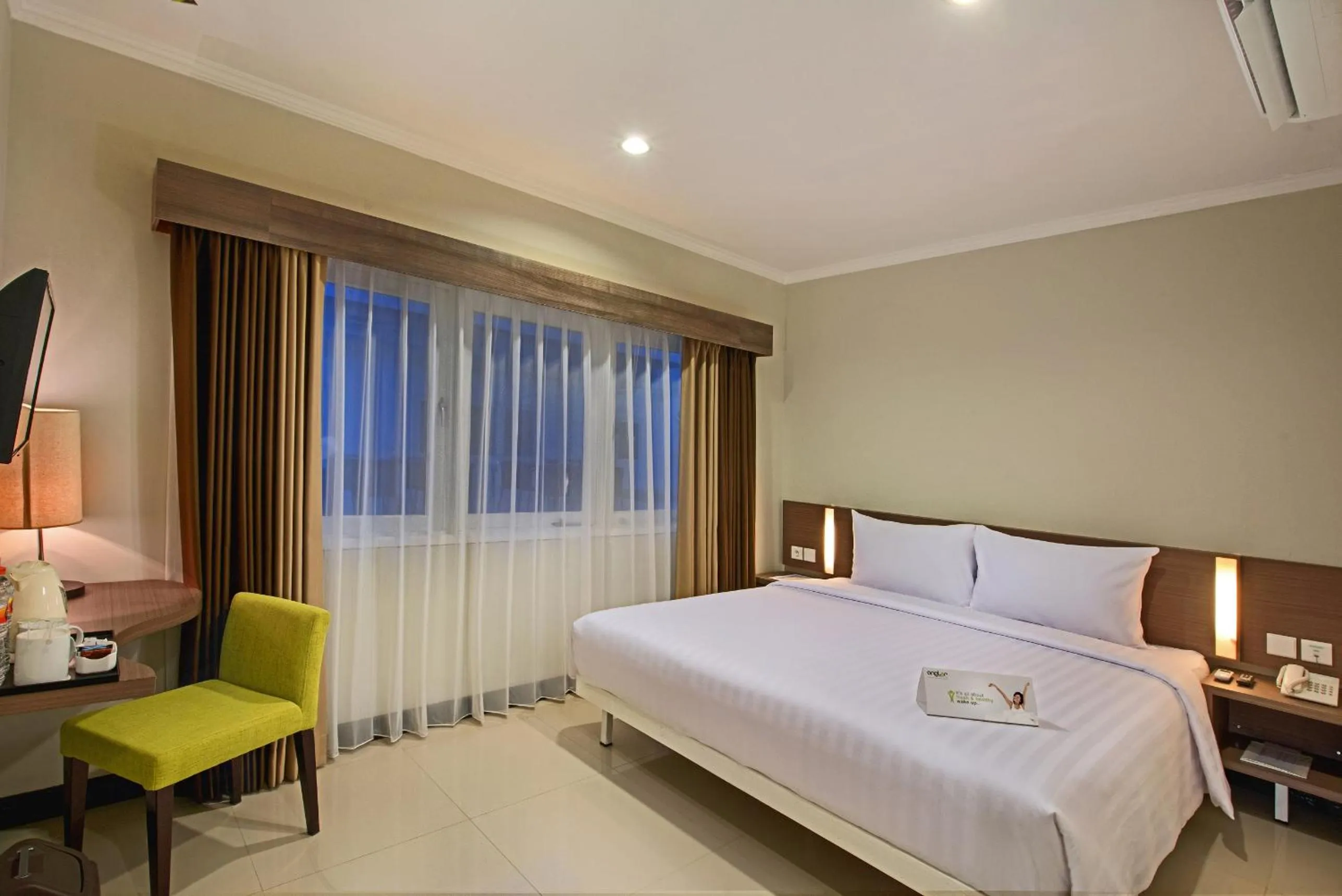 Photo of the whole room in Whiz Prime Hotel Darmo Harapan Surabaya