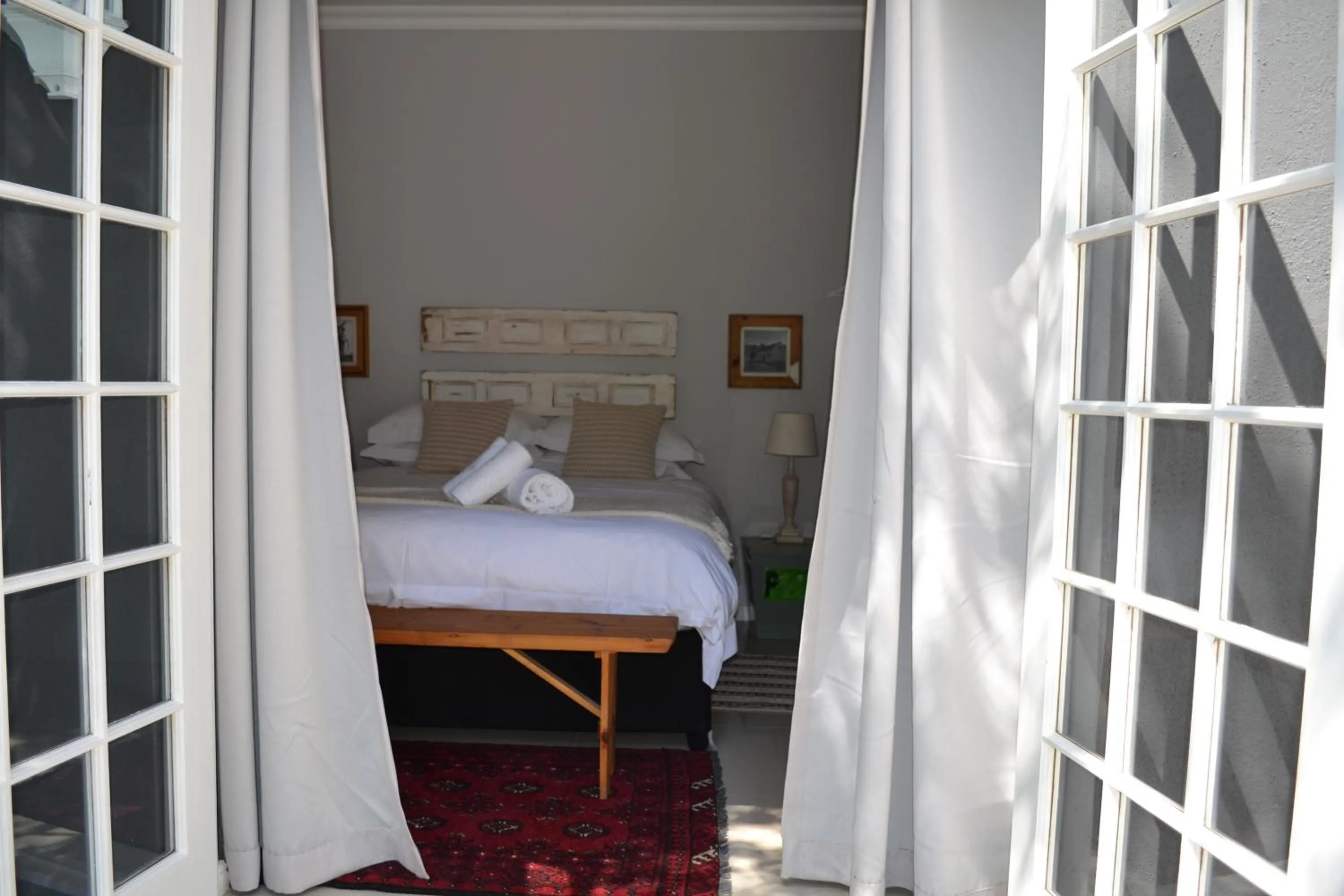 Bed in The Garden Shed Guest House