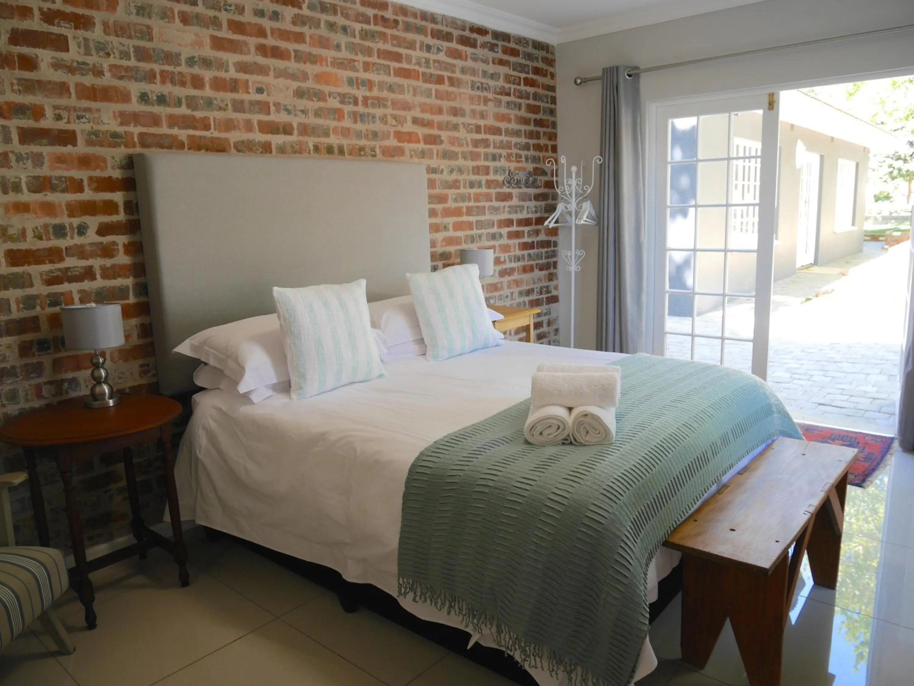 Bed in The Garden Shed Guest House