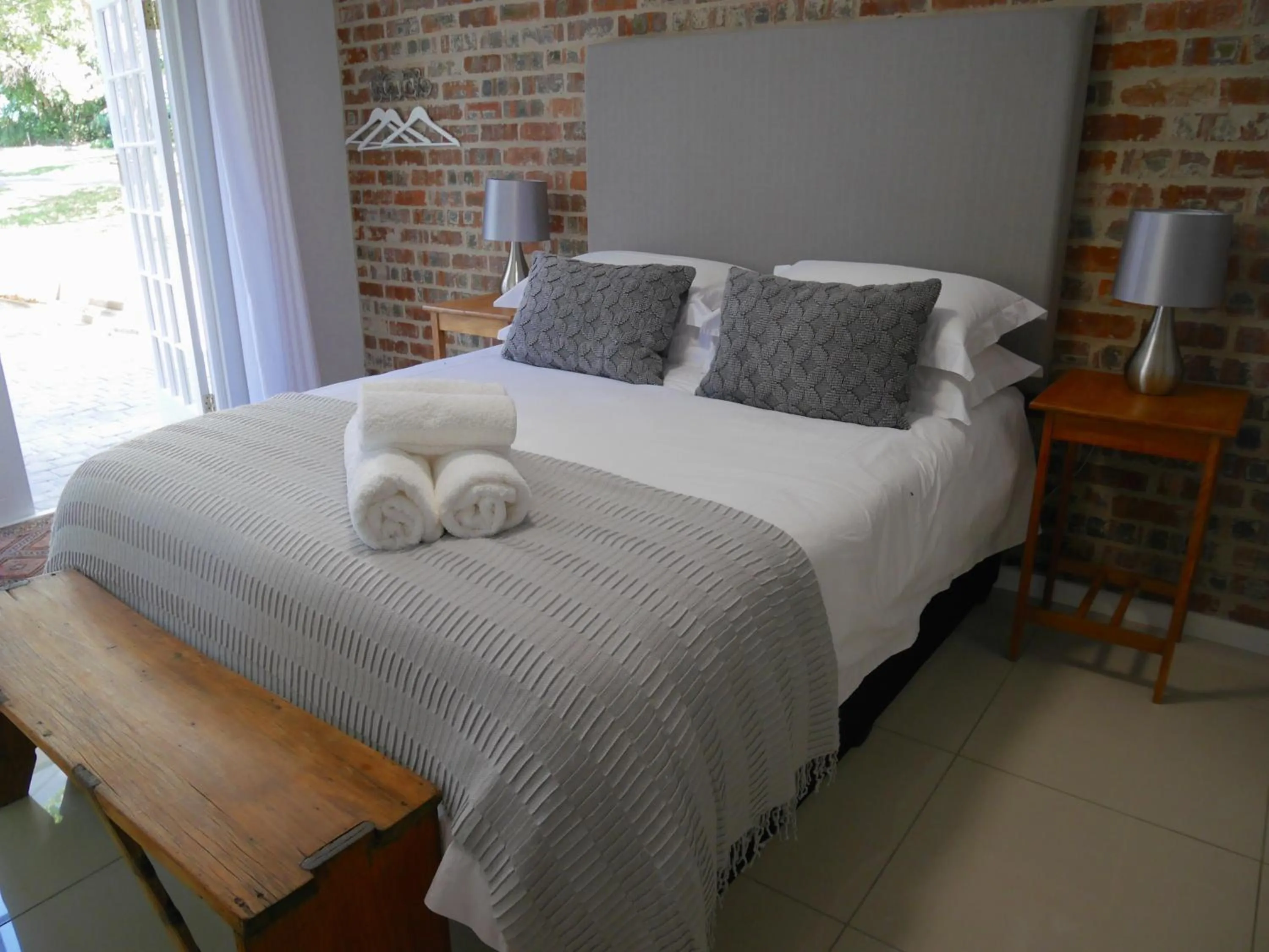 Bed in The Garden Shed Guest House