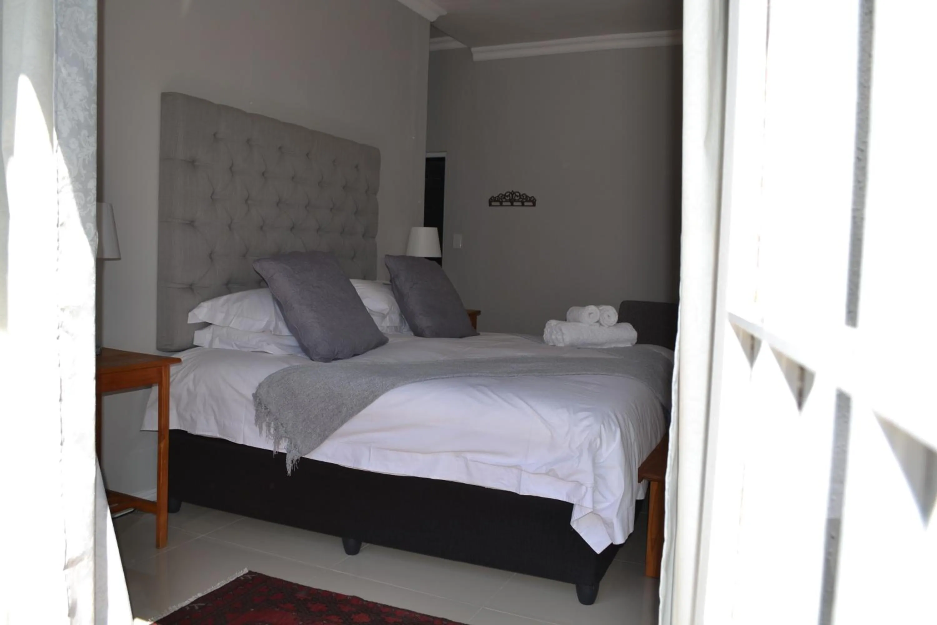 Bed in The Garden Shed Guest House