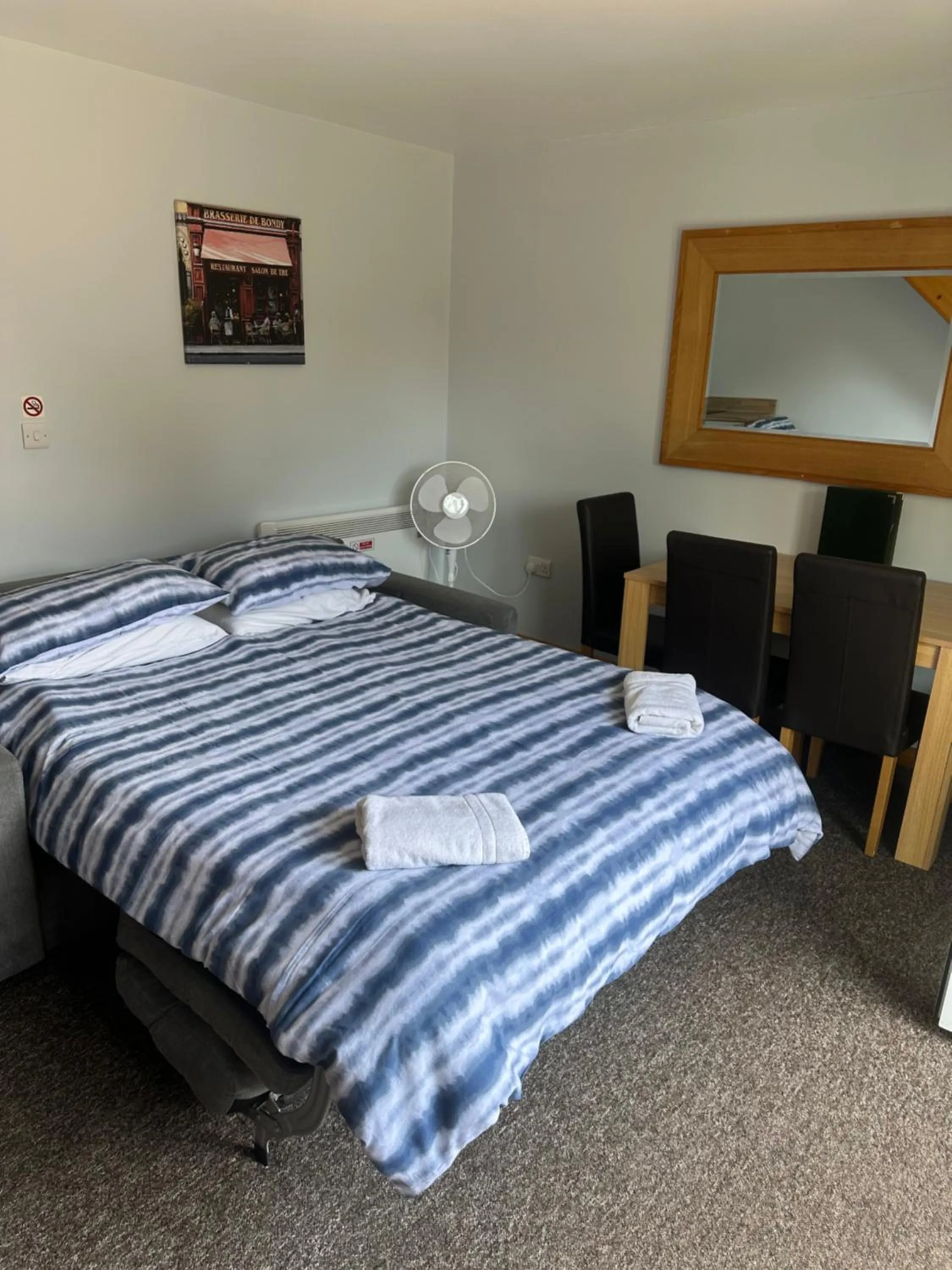 Bed in Forest Edge Motel