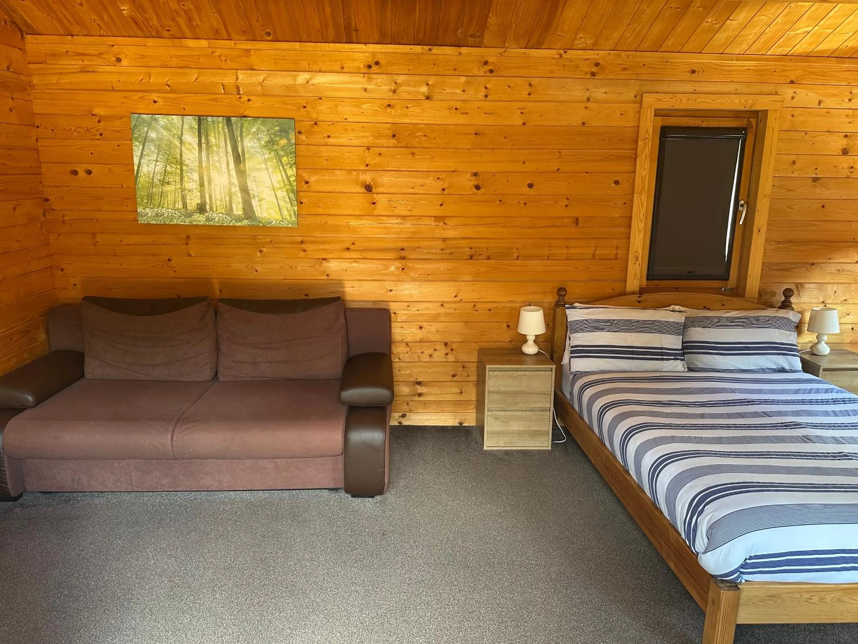 Bed in Forest Edge Motel