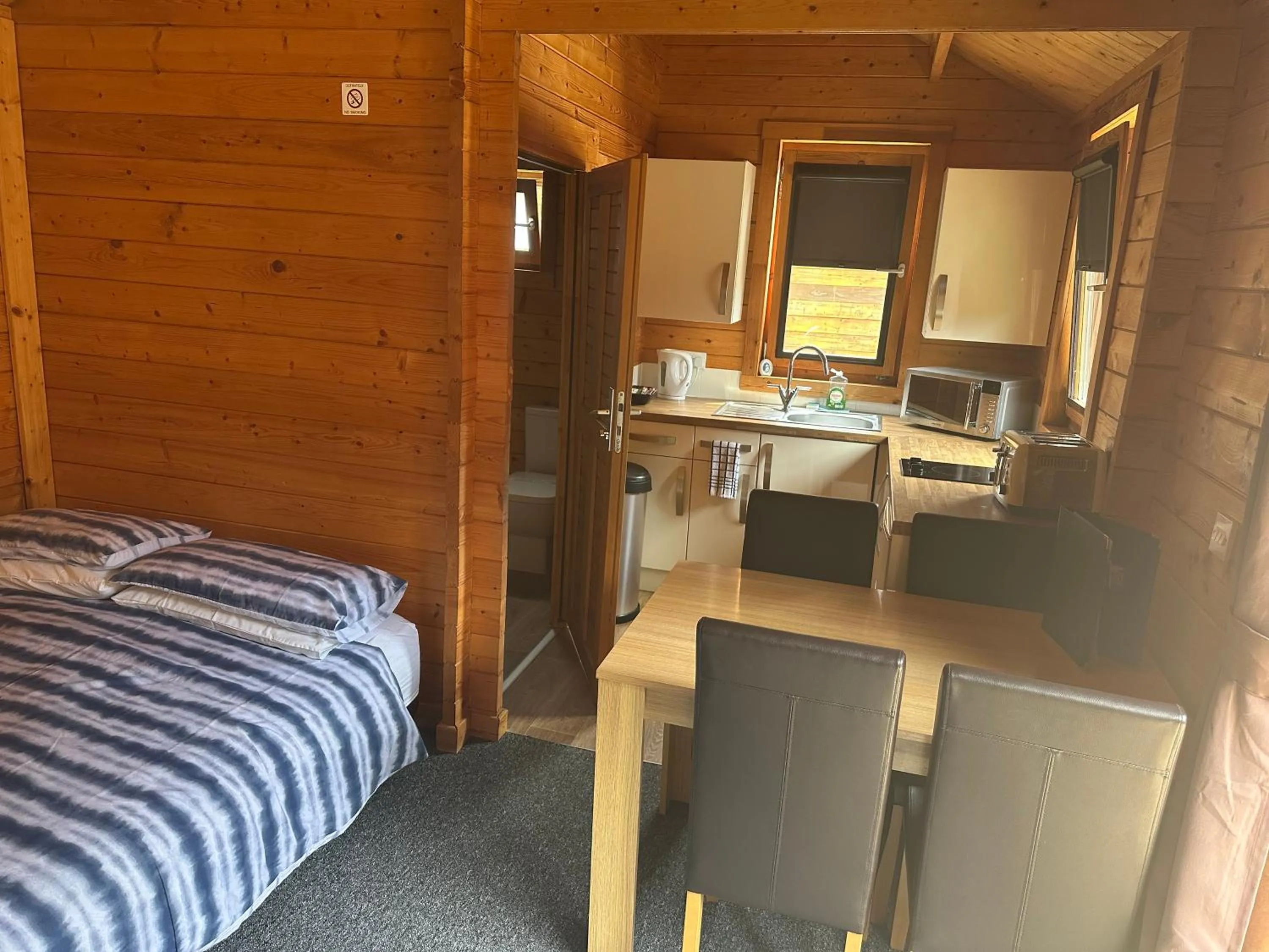 Bed in Forest Edge Motel