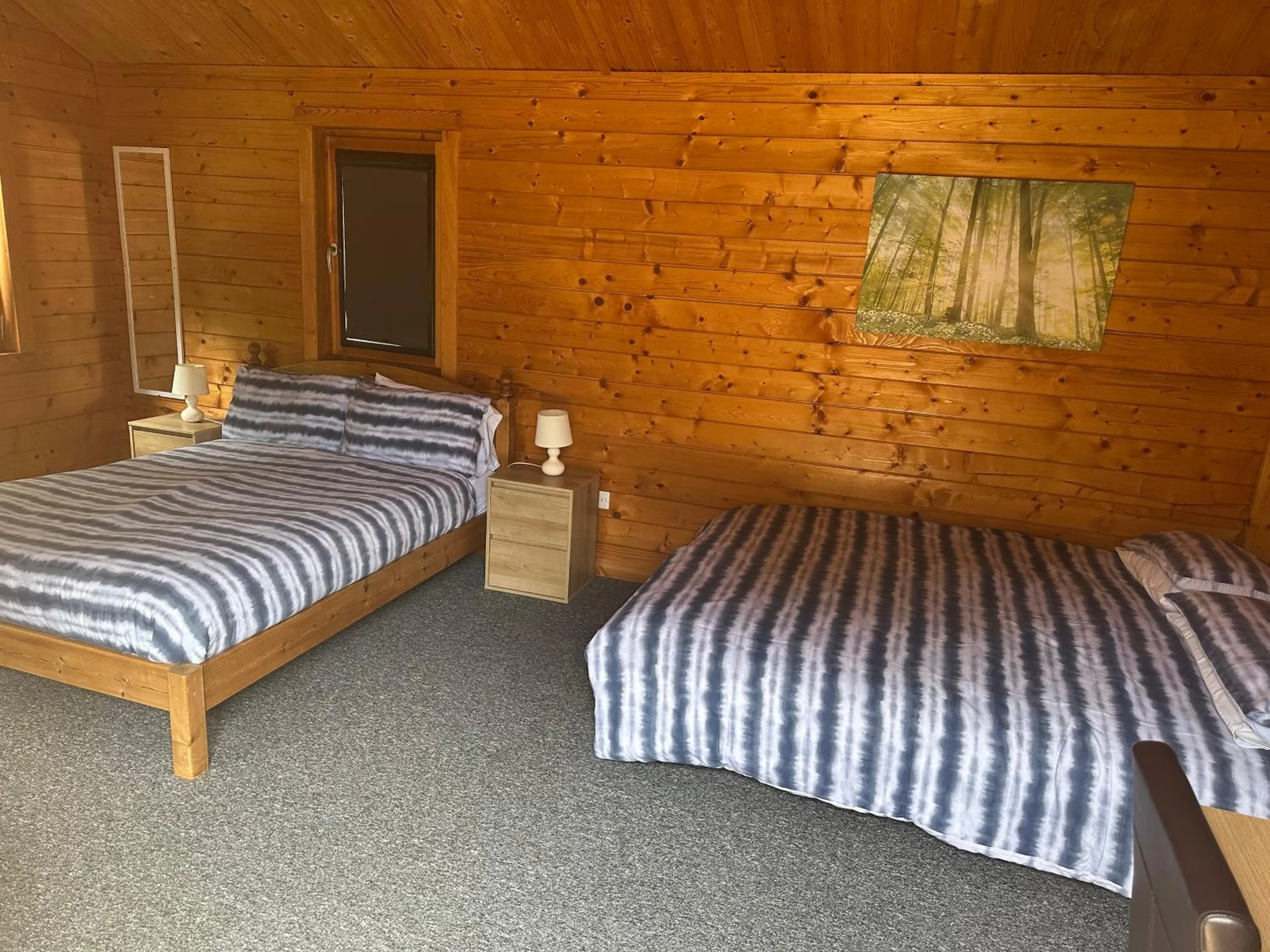 Bed in Forest Edge Motel