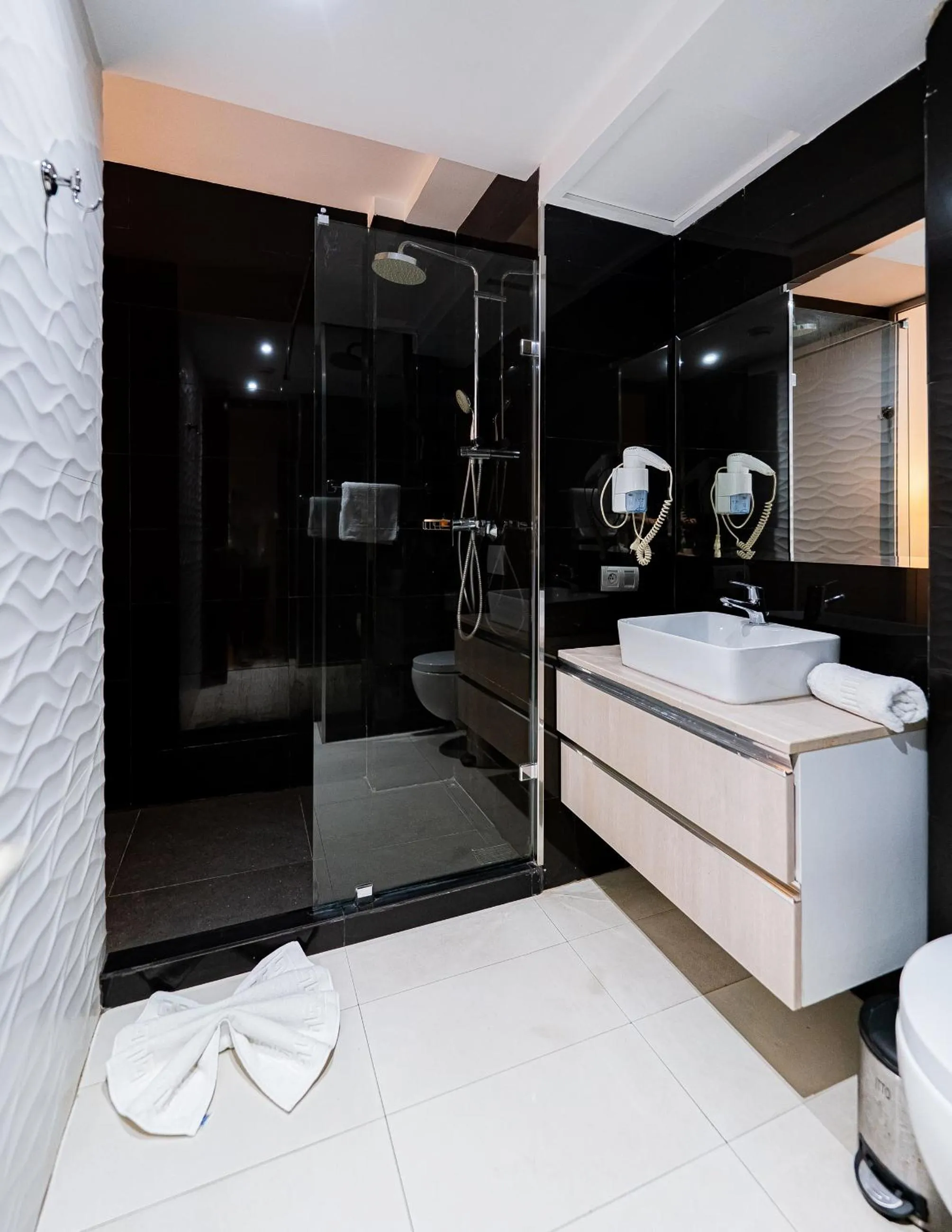 Bed in The Fourteen Luxury Boutique Hotel & SPA