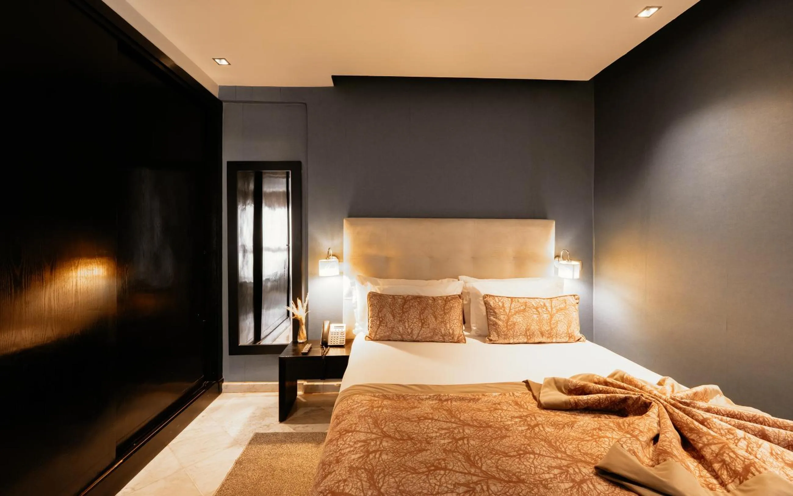 Bed in The Fourteen Luxury Boutique Hotel & SPA