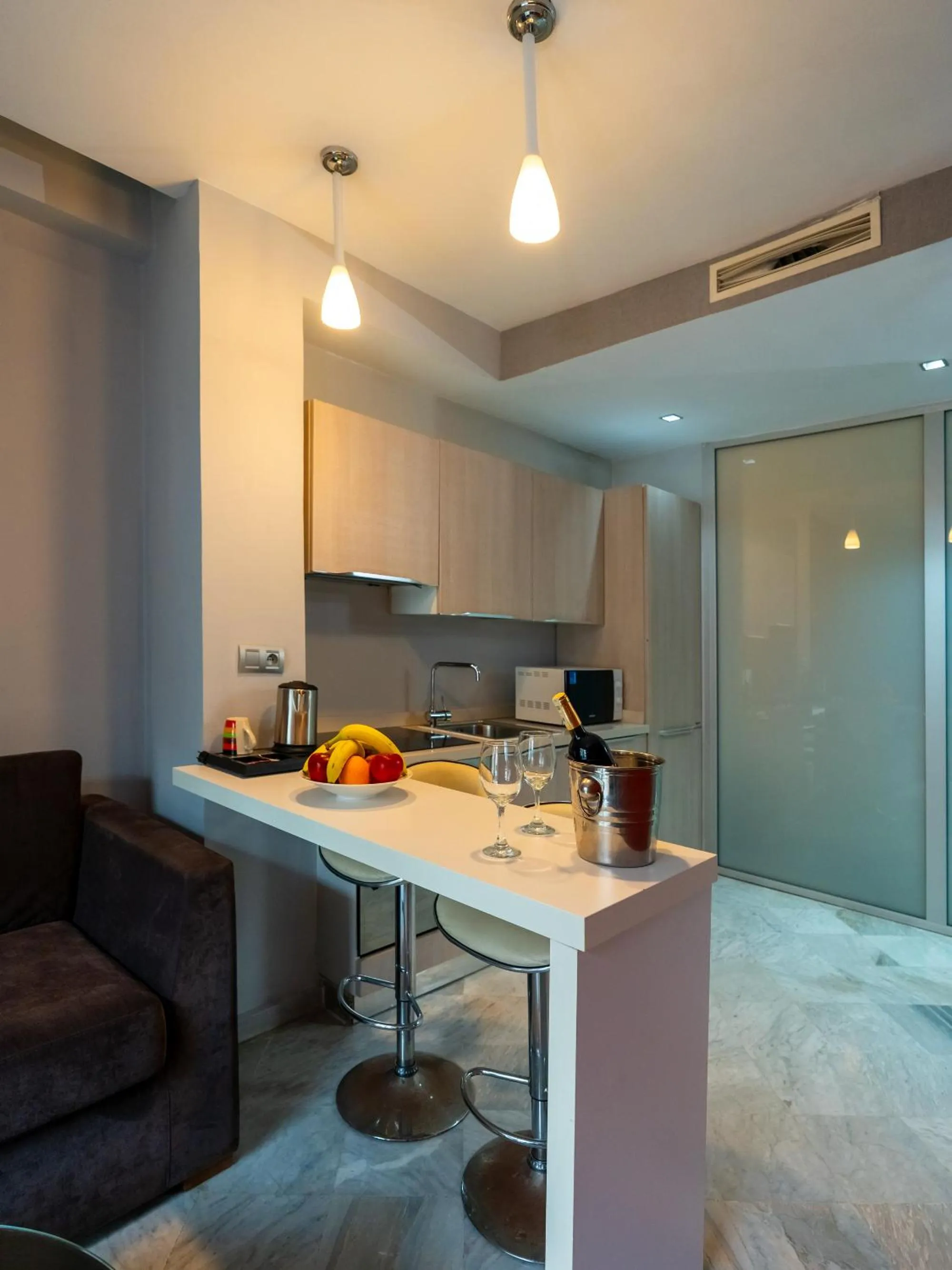Kitchen or kitchenette in The Fourteen Luxury Boutique Hotel