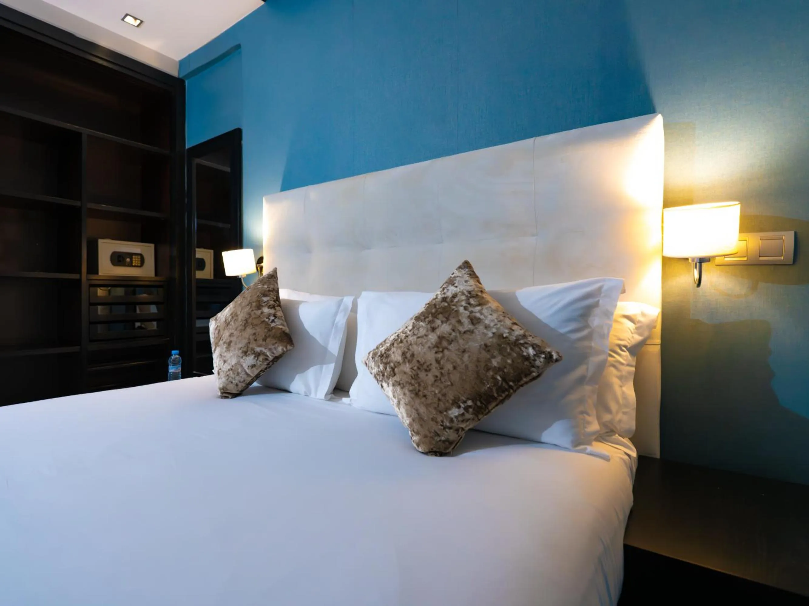 Bed in The Fourteen Luxury Boutique Hotel