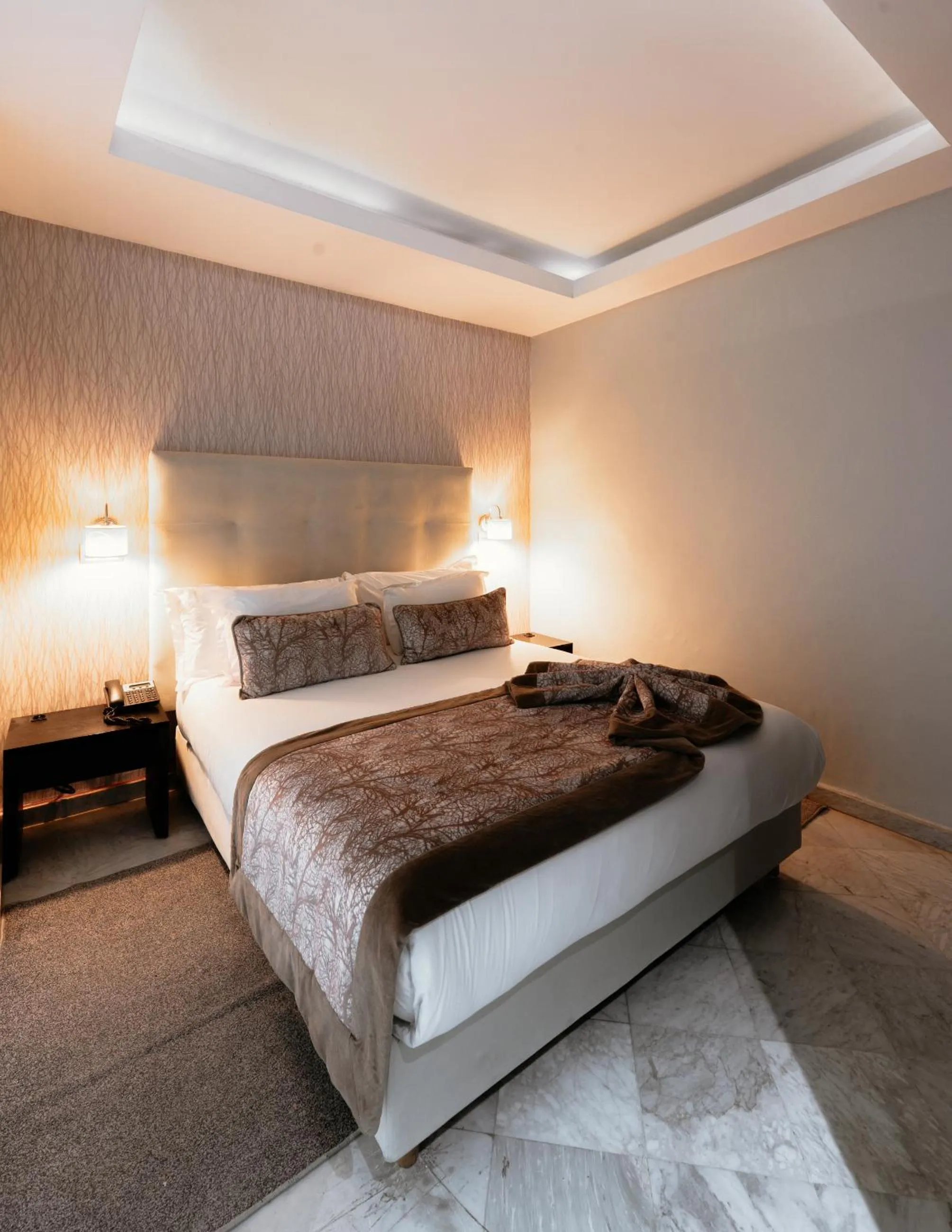 Bed in The Fourteen Luxury Boutique Hotel & SPA