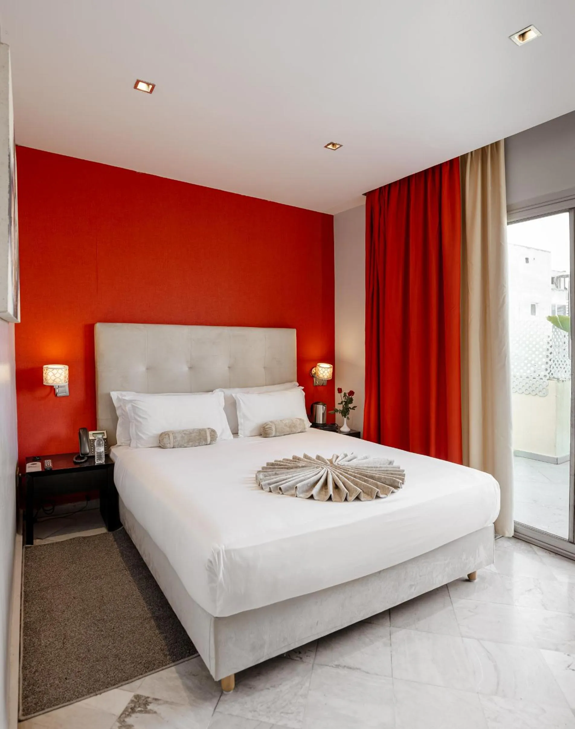 Bed in The Fourteen Luxury Boutique Hotel