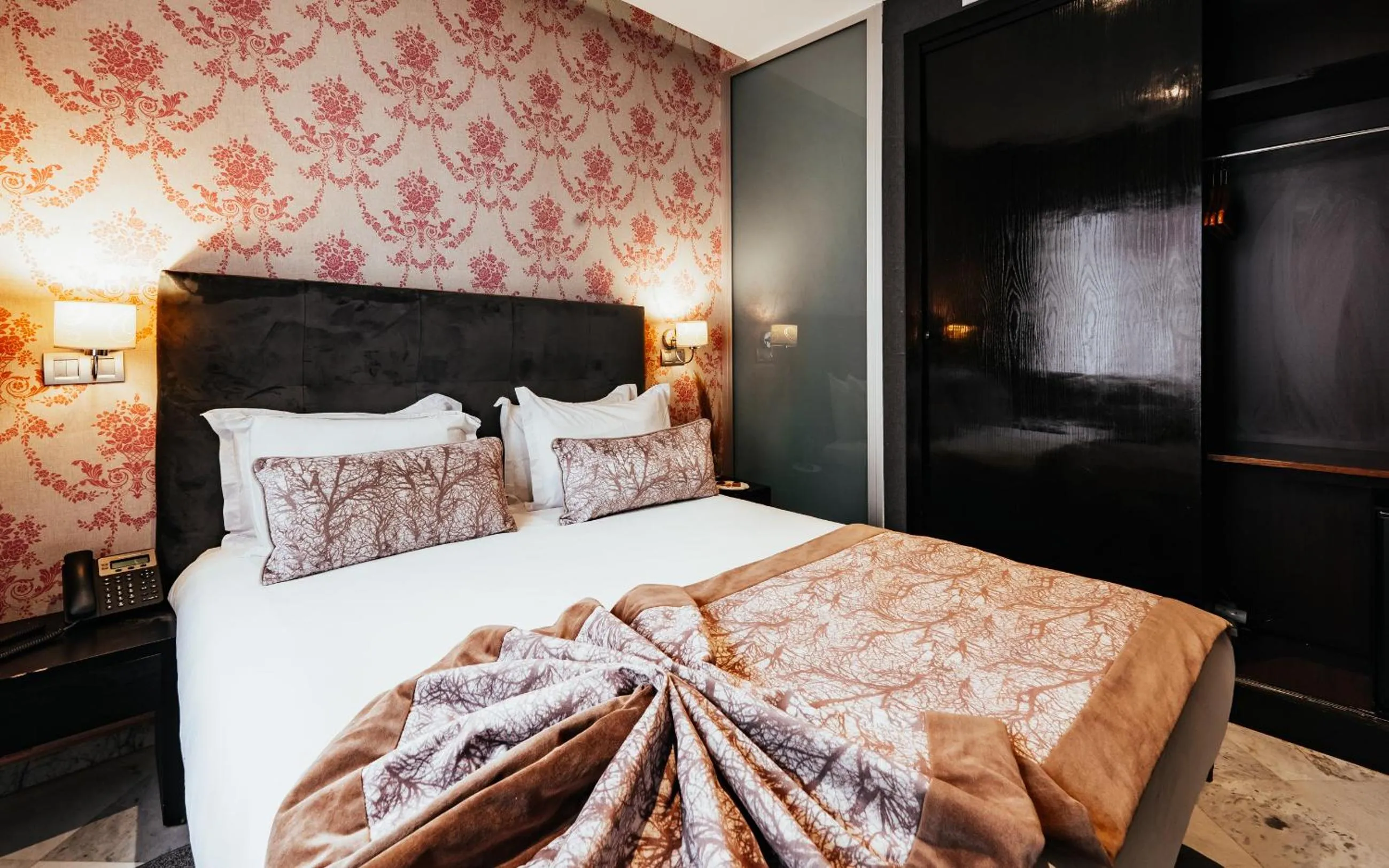 Bed in The Fourteen Luxury Boutique Hotel & SPA