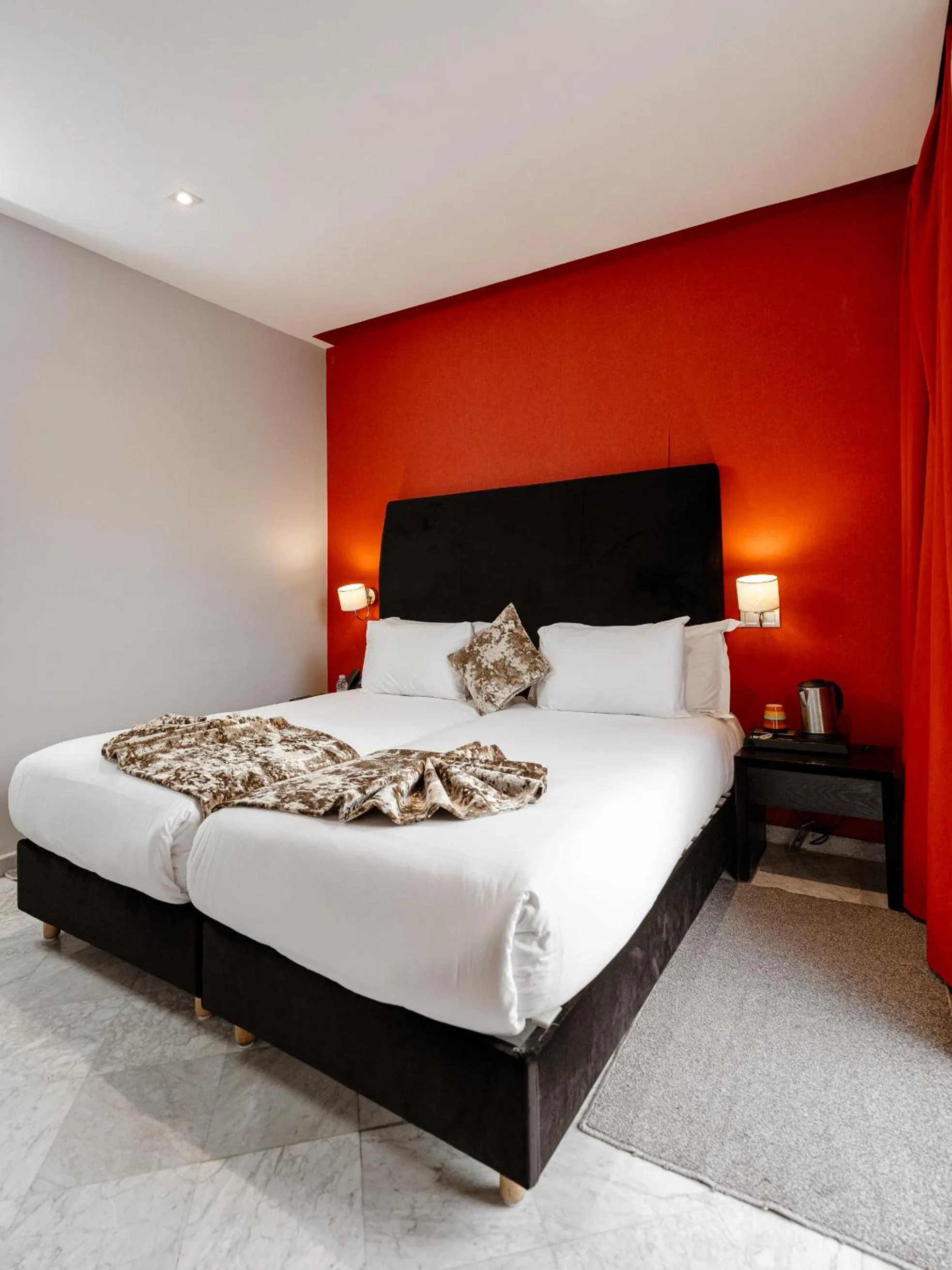 Bed in The Fourteen Luxury Boutique Hotel