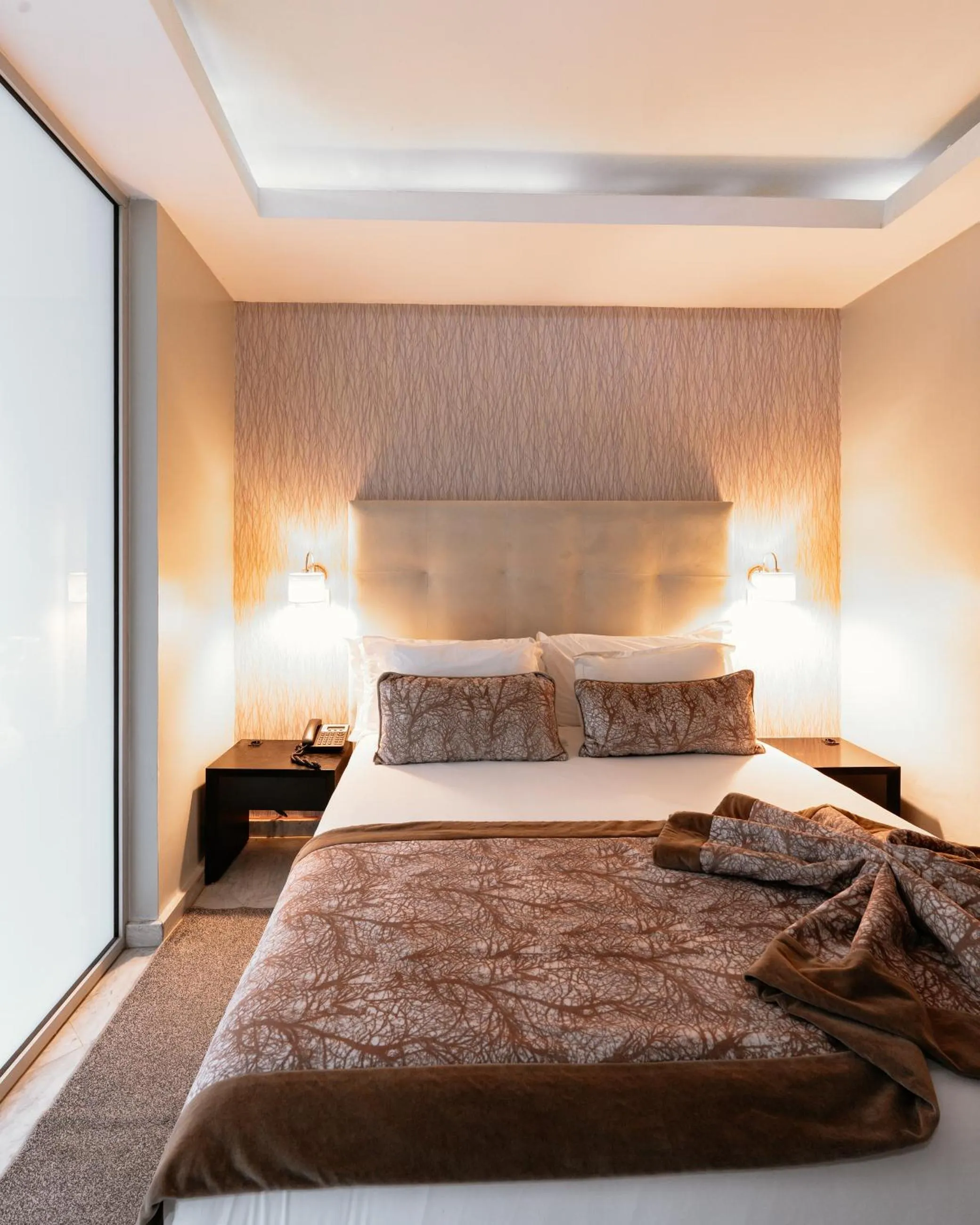 Bed in The Fourteen Luxury Boutique Hotel & SPA