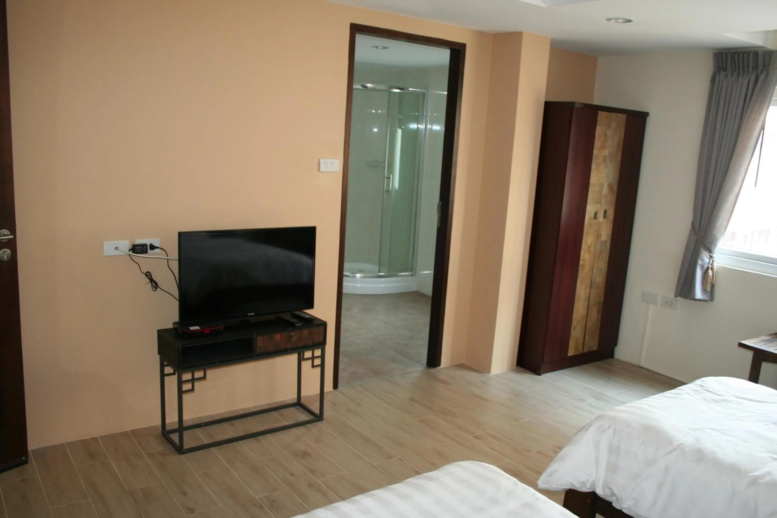 Photo of the whole room, Bed in Arcadia Maephim Serviced Apartments