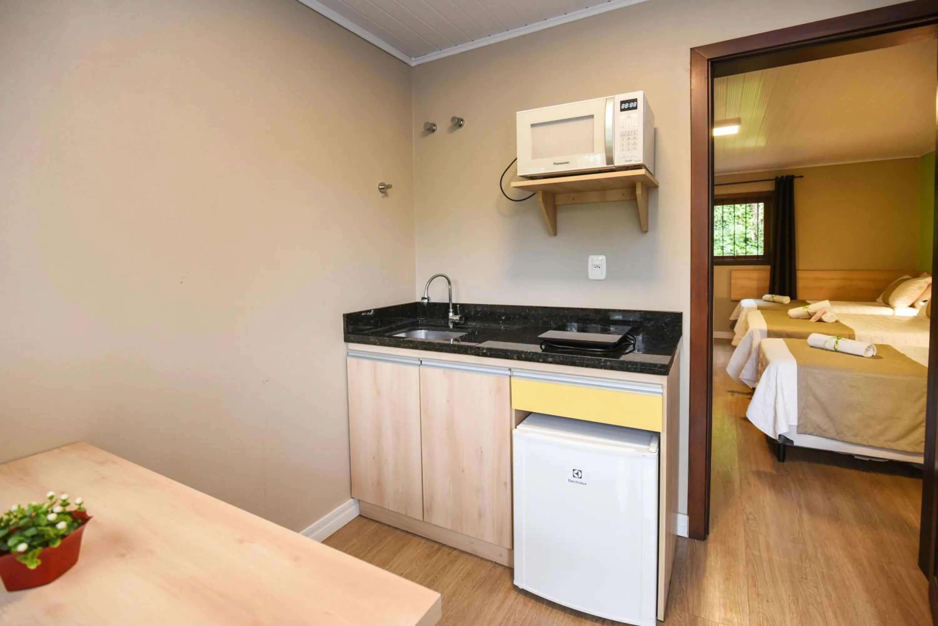 Kitchen or kitchenette in Pousada Três Pinheiros