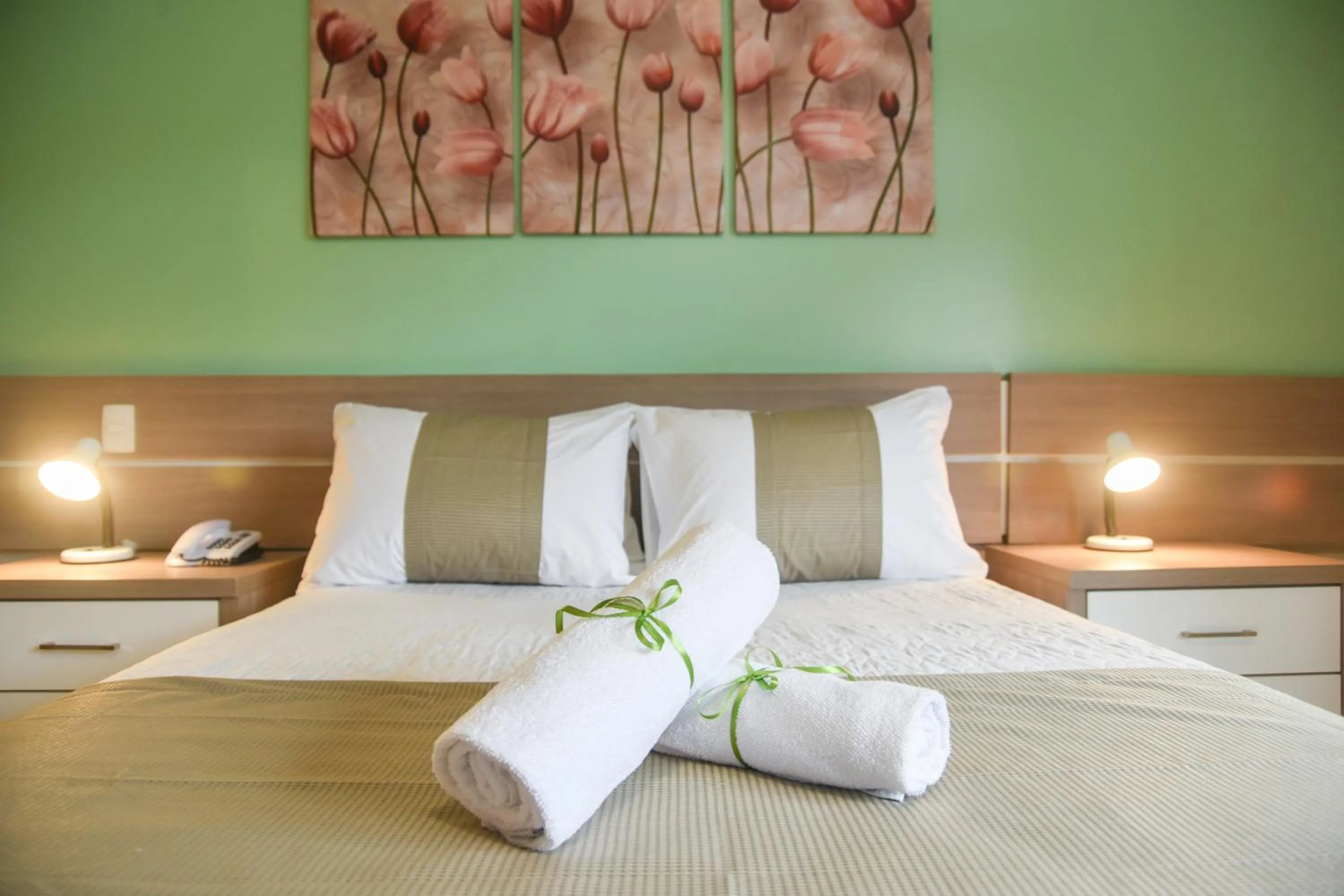 Bed in Pousada Três Pinheiros