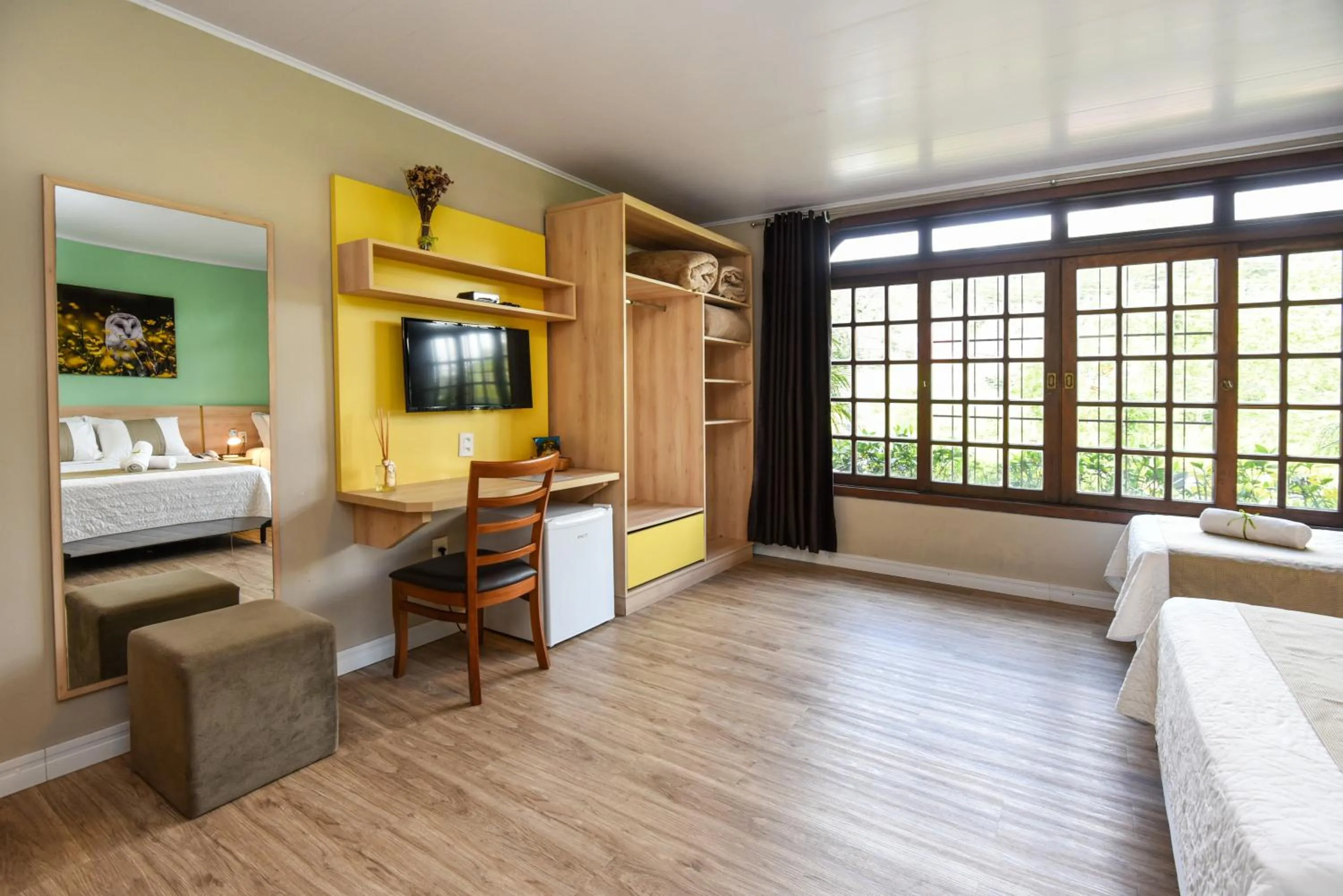 Photo of the whole room, Bed in Pousada Três Pinheiros