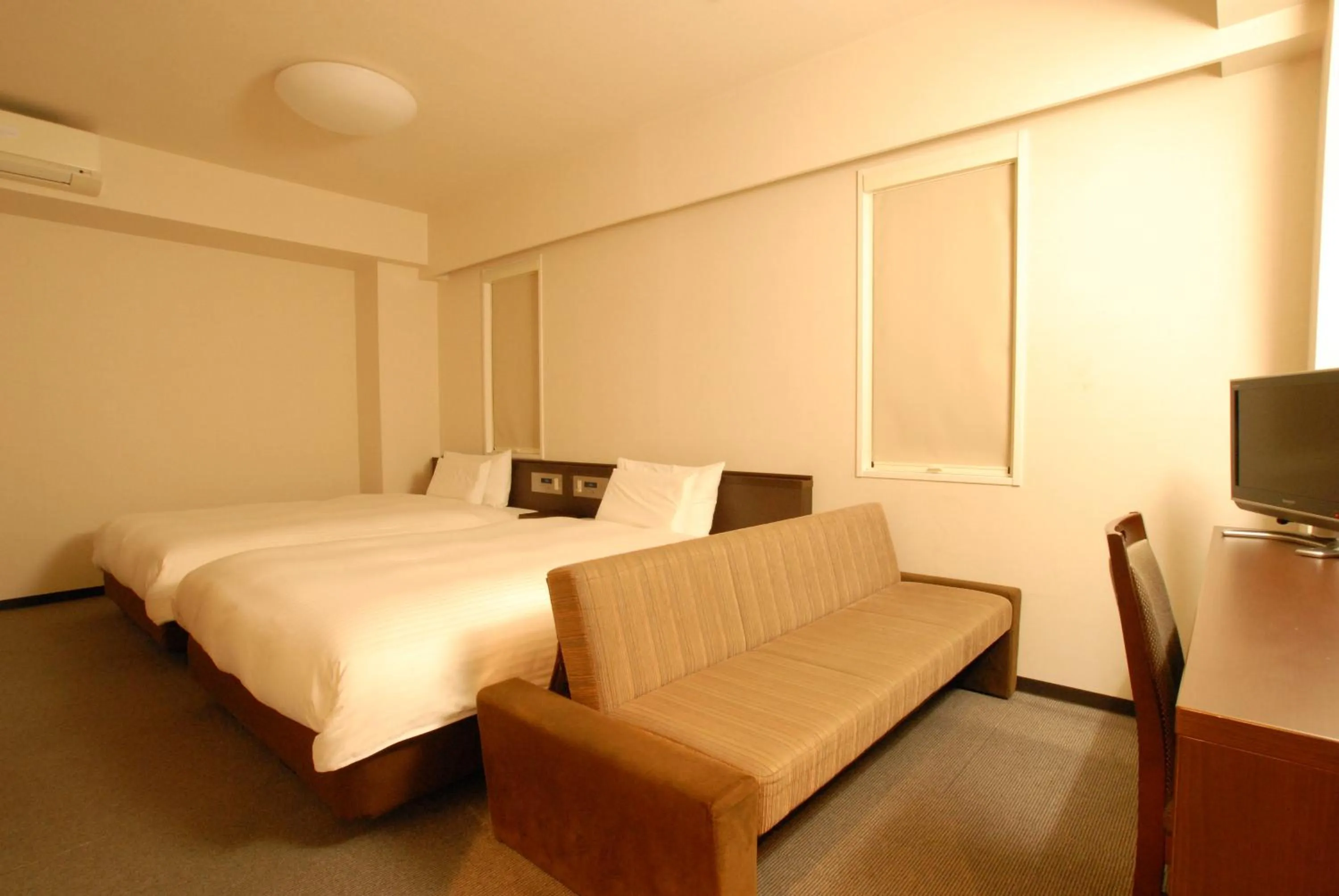 Bed in AB Hotel Toyota Motomachi