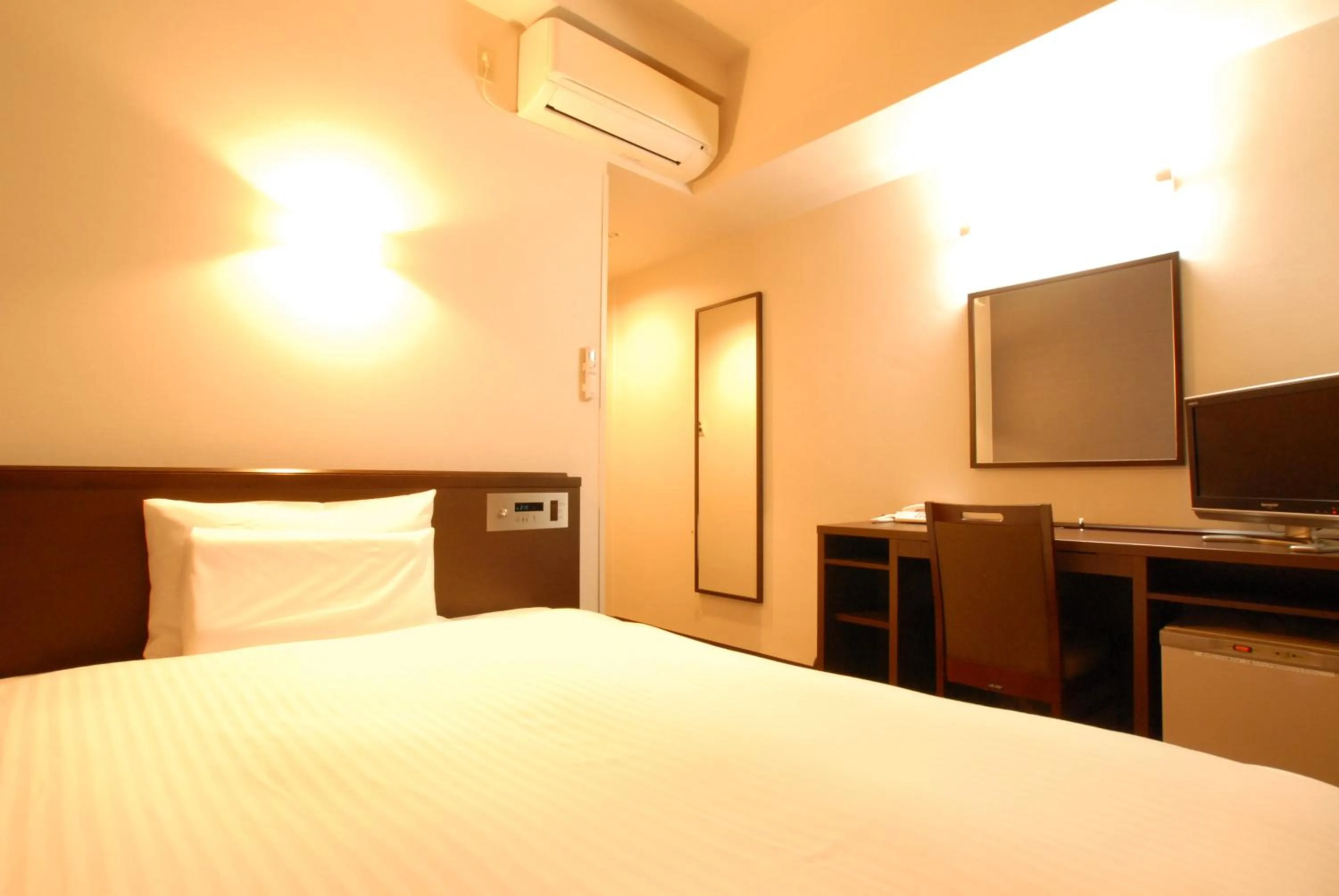 Decorative detail, Bed in AB Hotel Toyota Motomachi