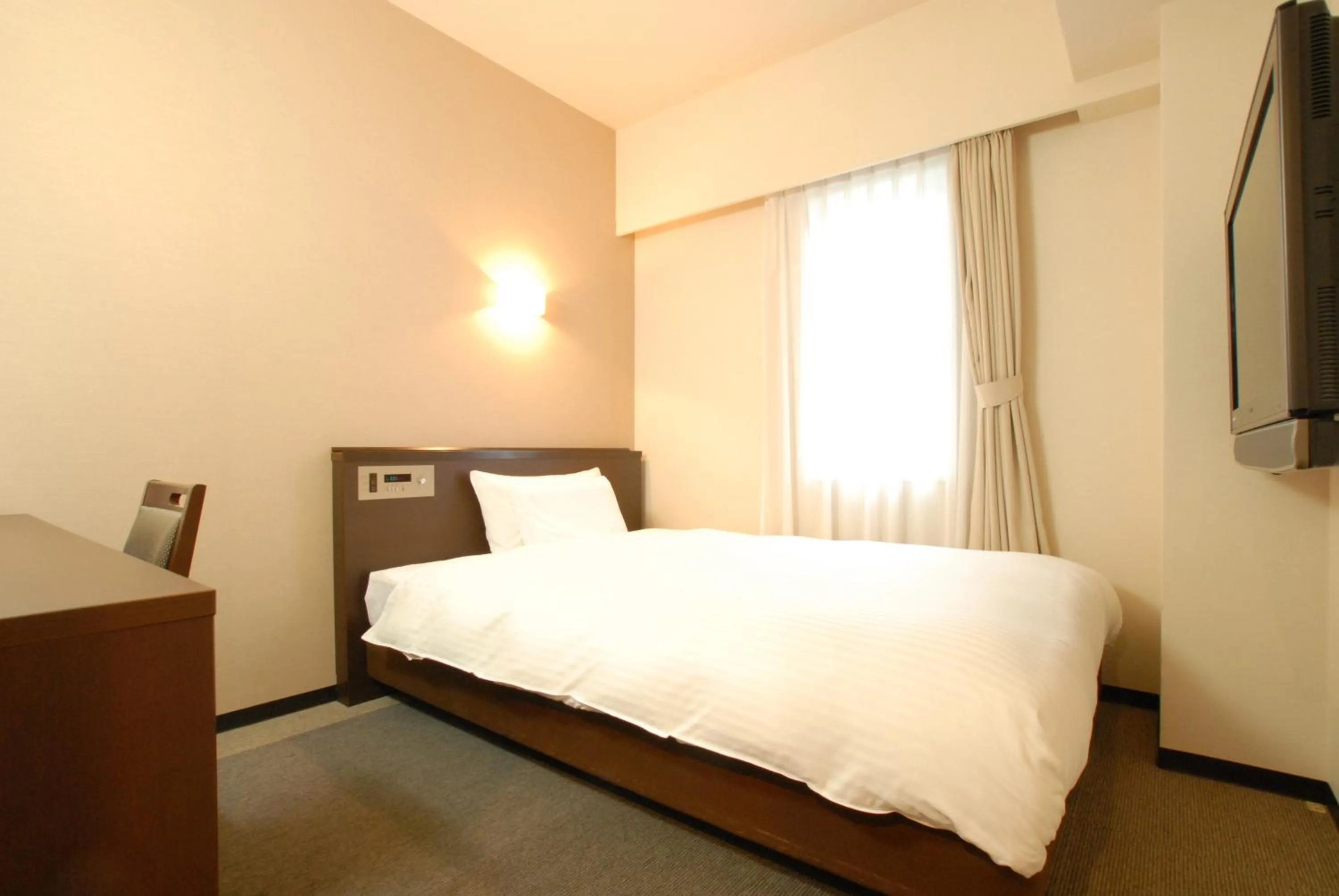 Bed in AB Hotel Toyota Motomachi