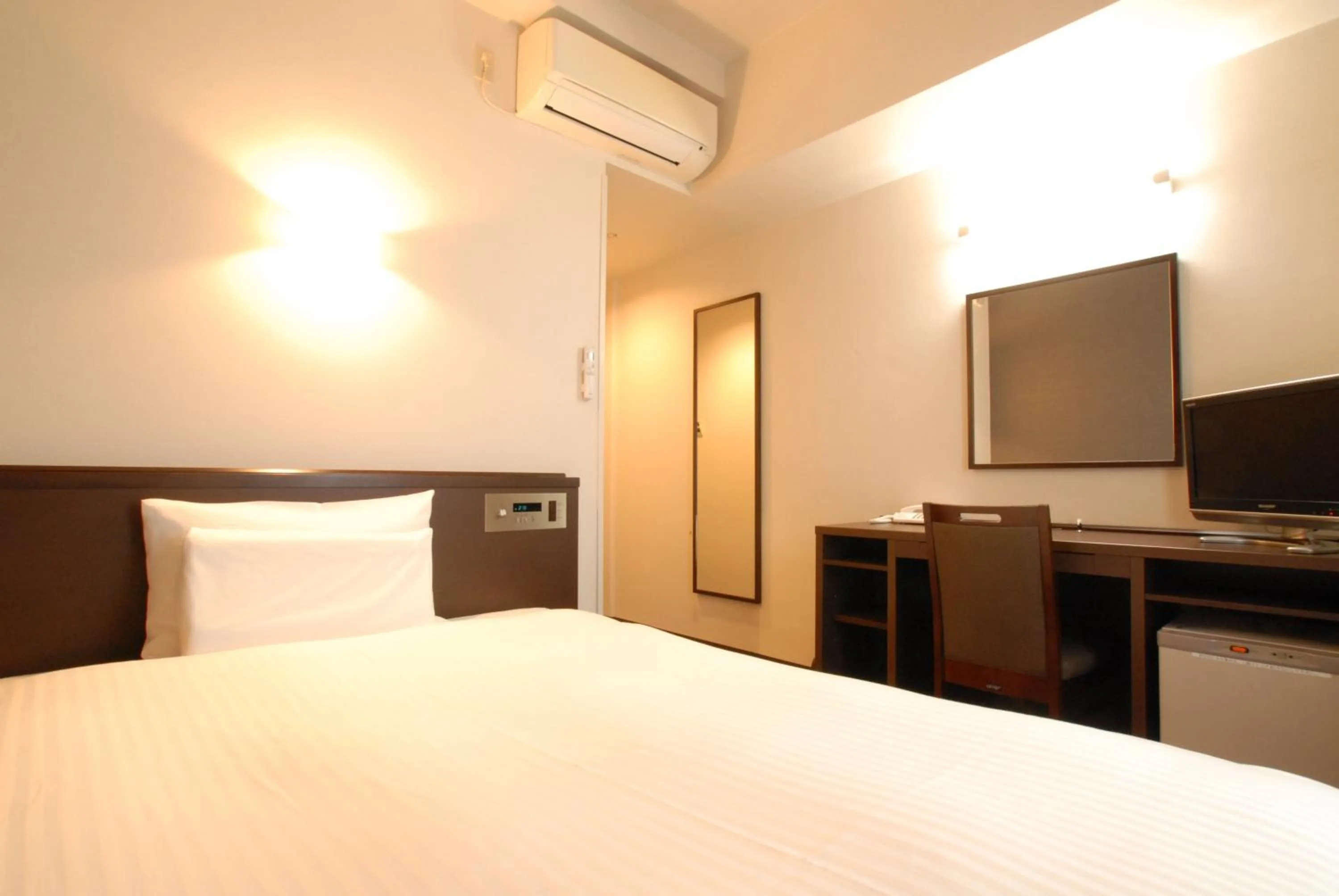 Decorative detail, Bed in AB Hotel Toyota Motomachi