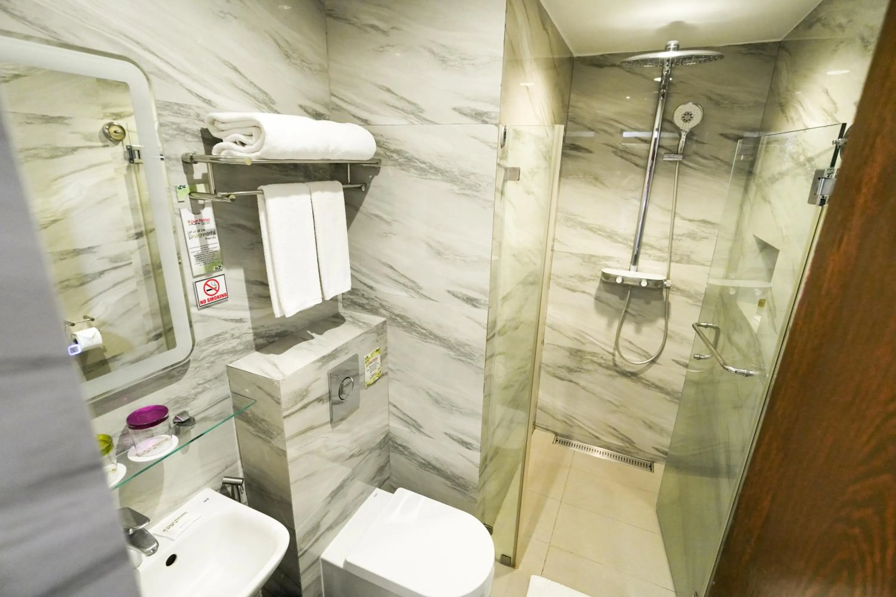 Bathroom in Court Meridian Hotel & Suites