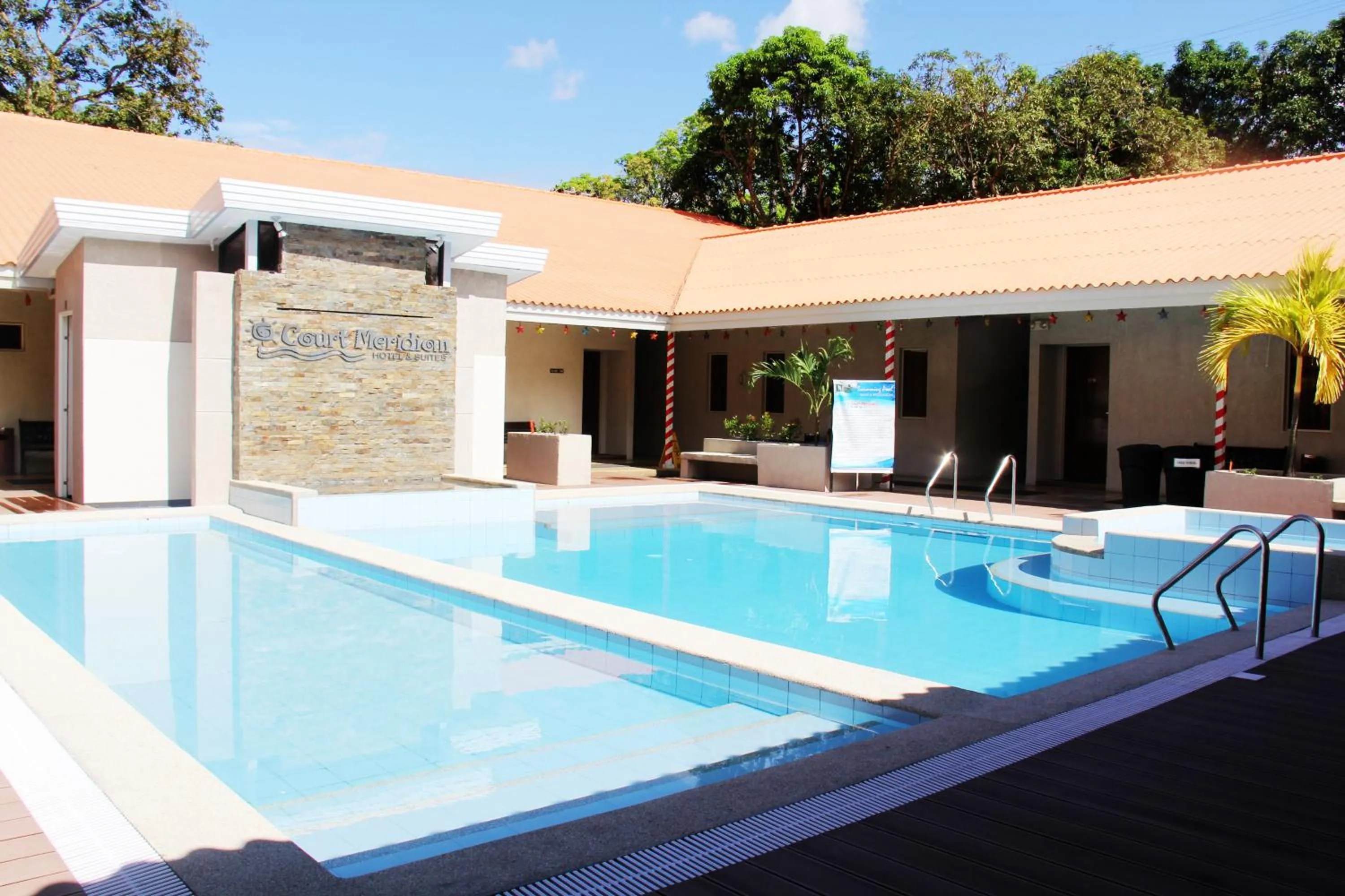 Swimming pool in Court Meridian Hotel & Suites