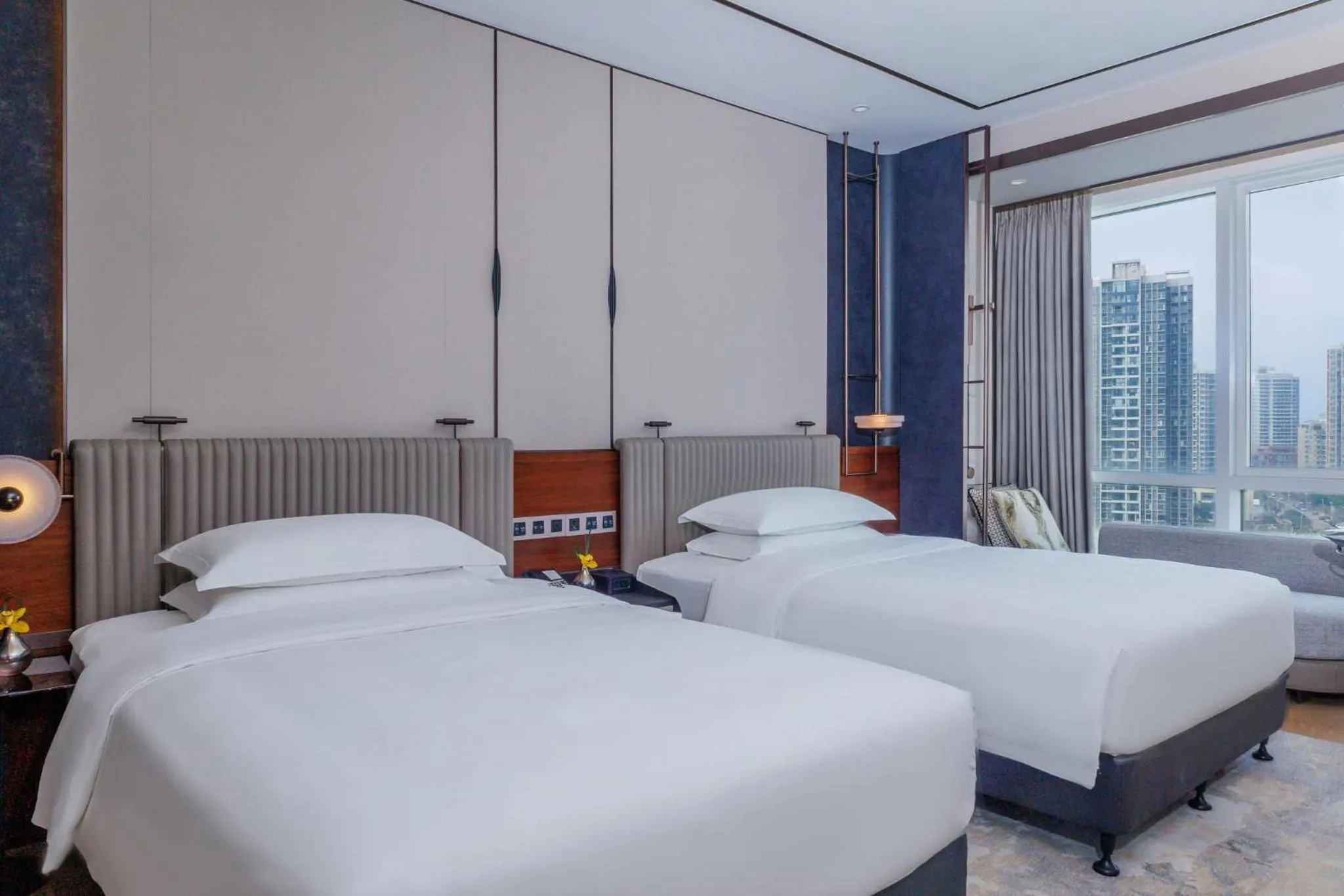 Photo of the whole room, Bed in InterContinental Haikou Seaview by IHG