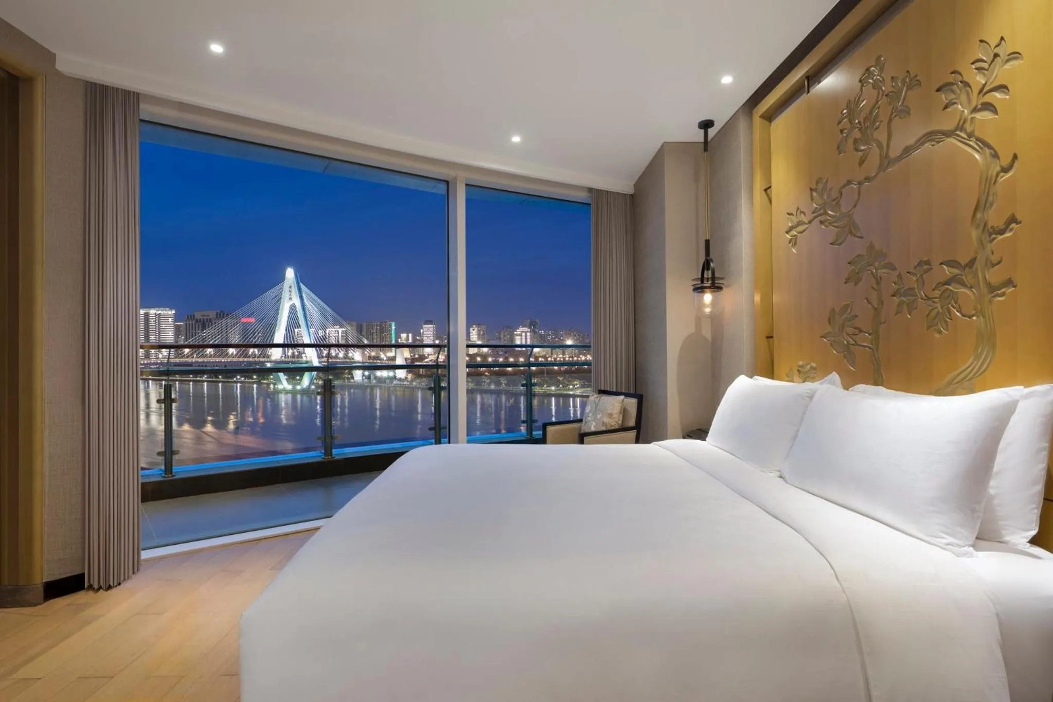 Photo of the whole room, Bed in InterContinental Haikou Seaview by IHG
