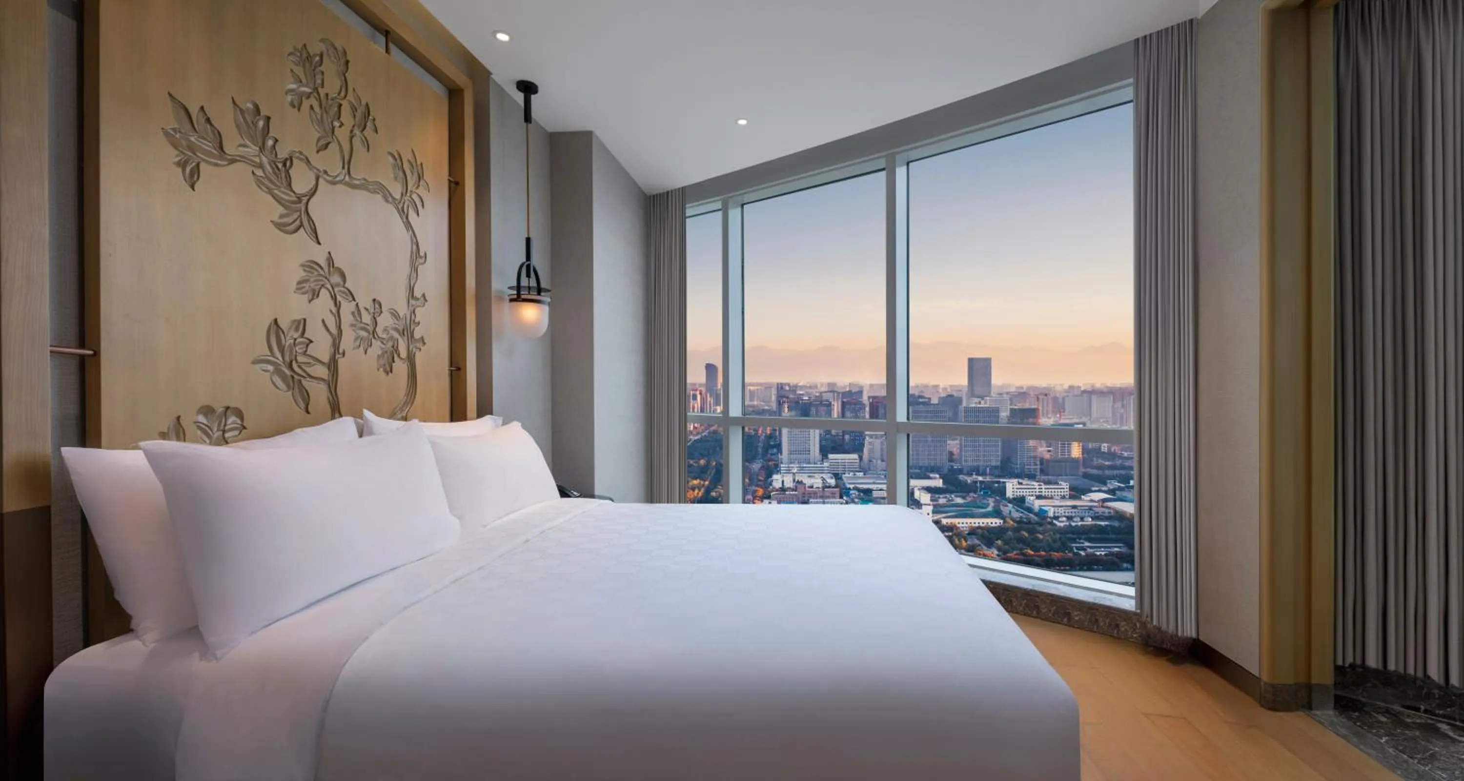 Photo of the whole room, Bed in InterContinental Haikou Seaview by IHG