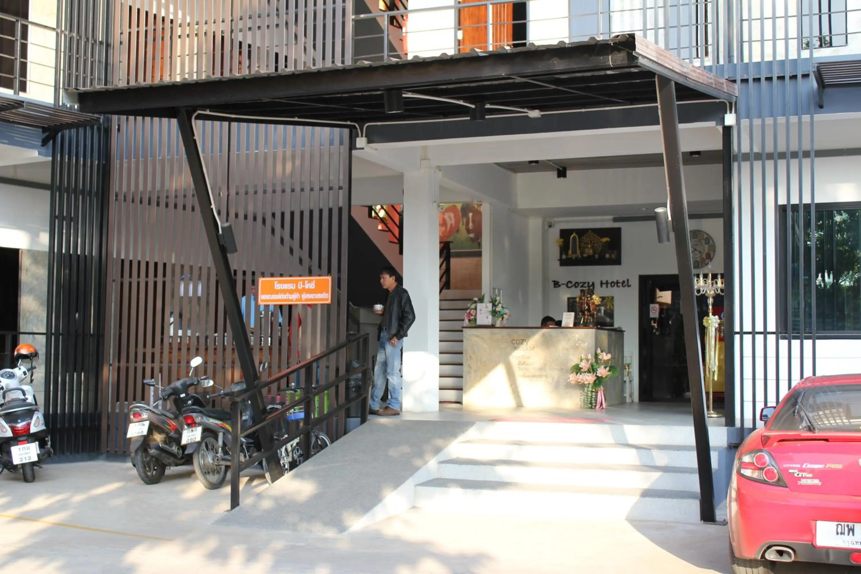 Facade/entrance in B-Cozy Hotel