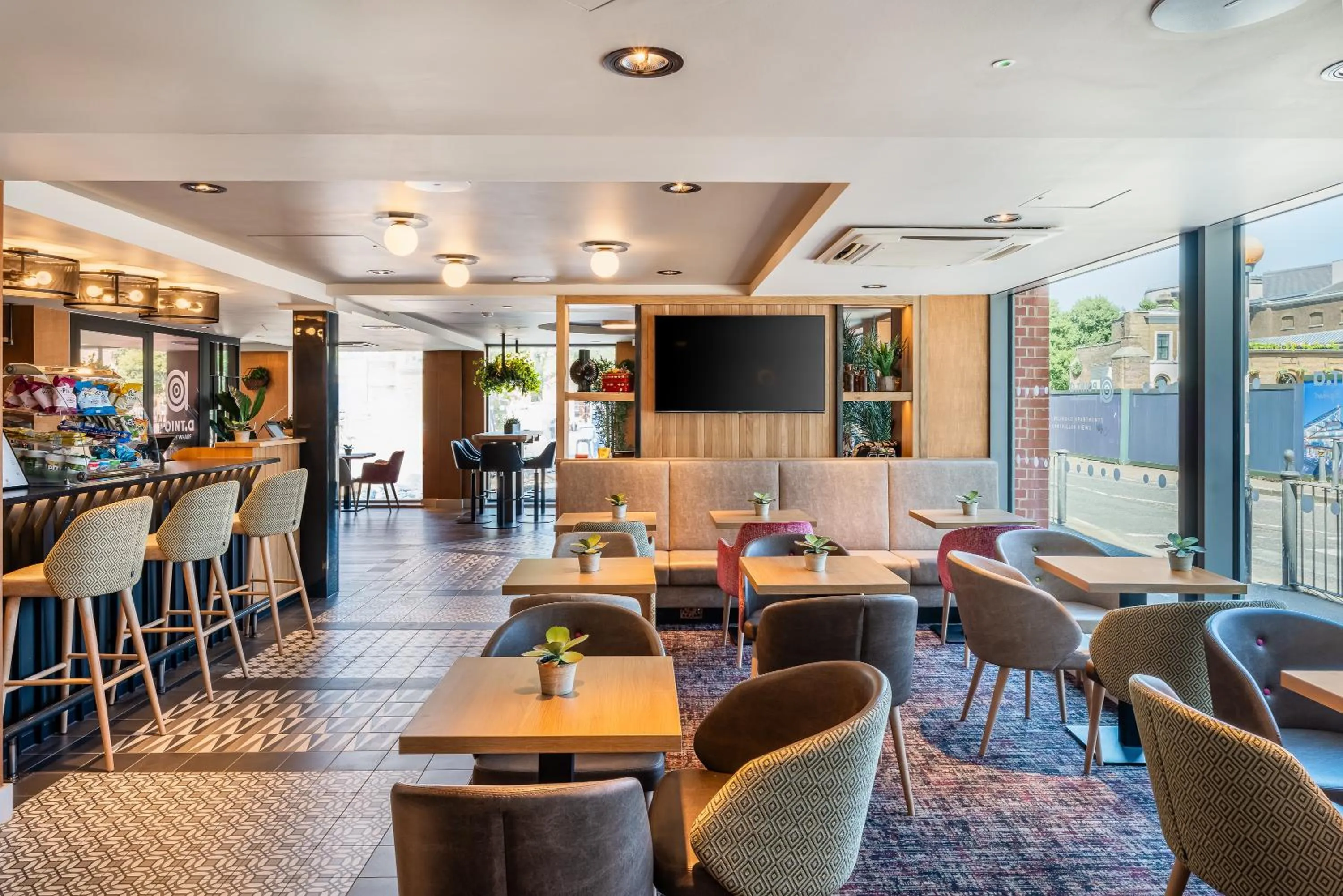 Communal lounge/ TV room in Point A Hotel London Canary Wharf