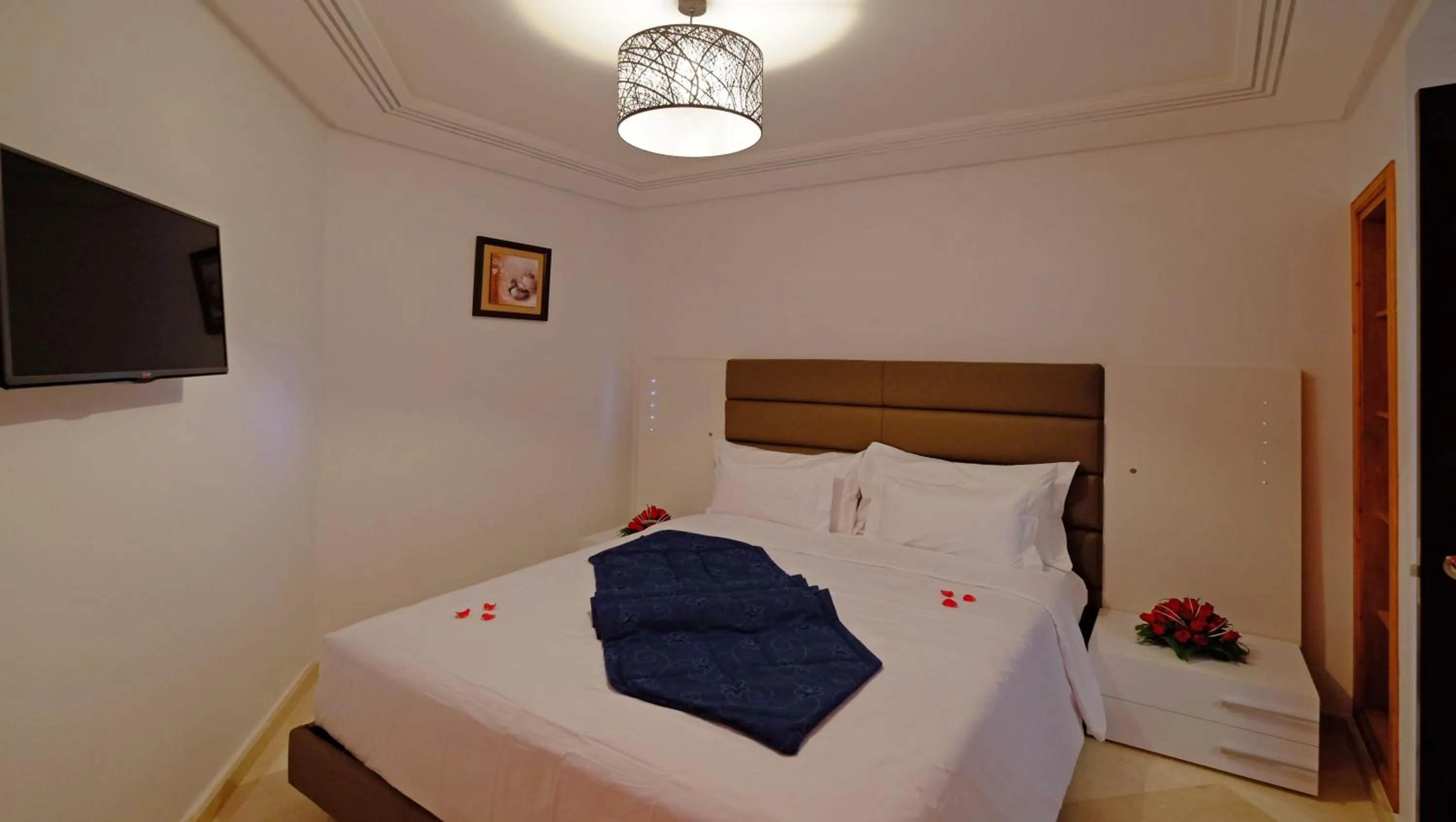 Bed in Appart Hôtel Mouna