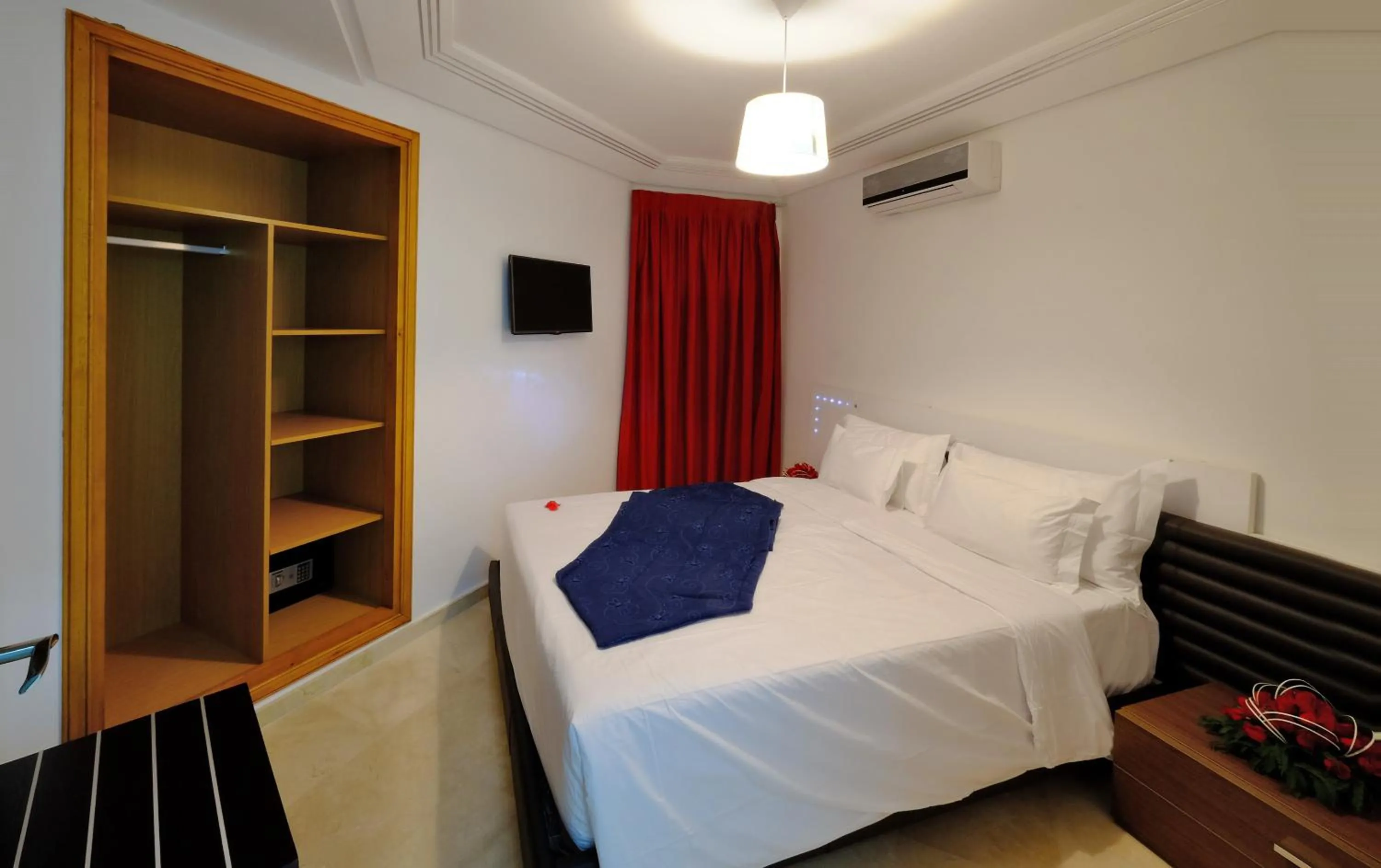 Bed in Appart Hôtel Mouna