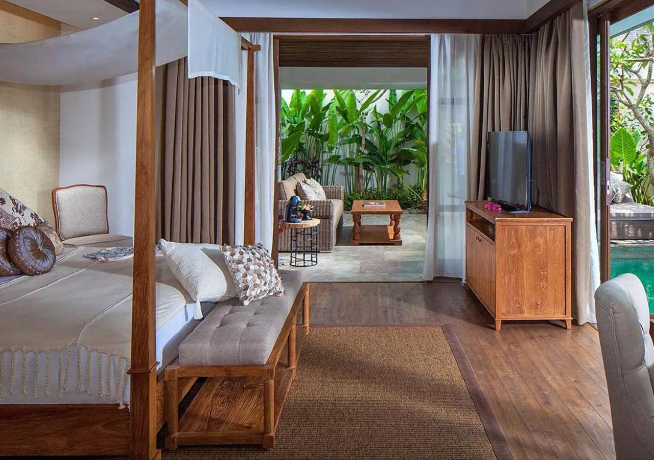 Communal lounge/ TV room, Bed in Goya Boutique Resort