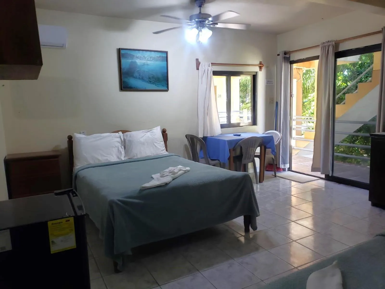 Bed in Beach Side Condos Caye Caulker by CCVH