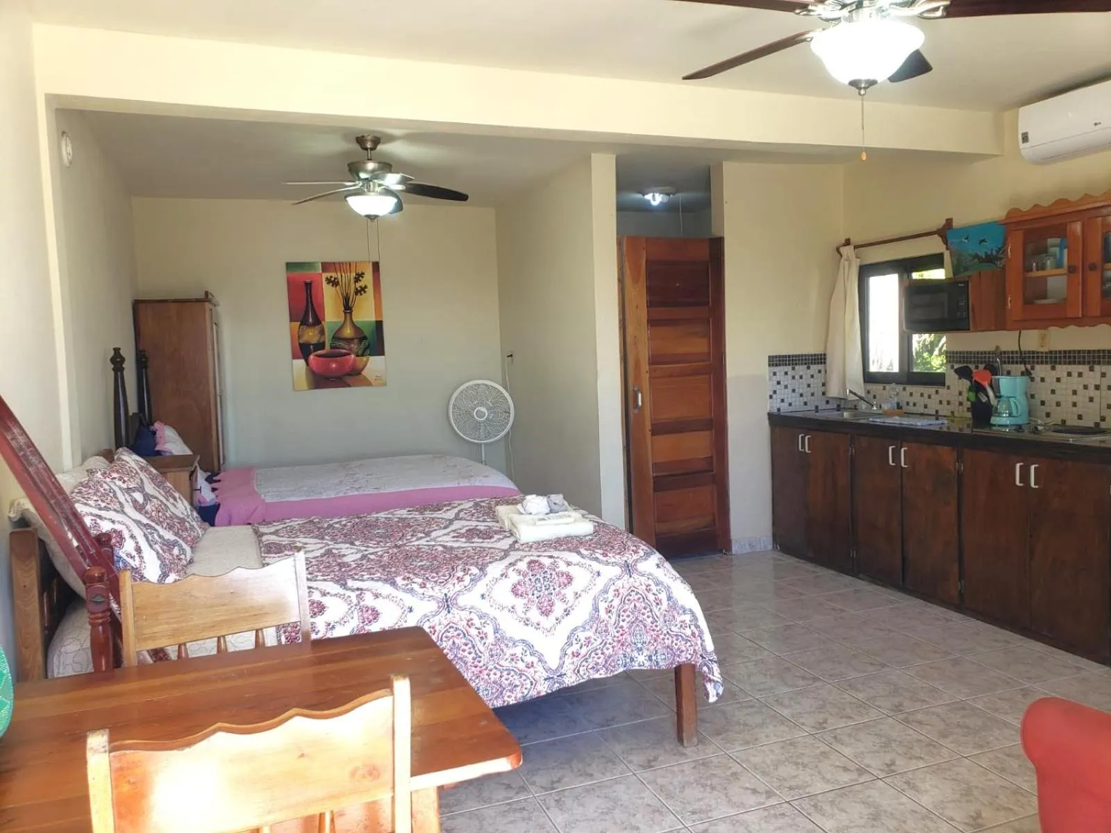 Bed in Beach Side Condos Caye Caulker by CCVH