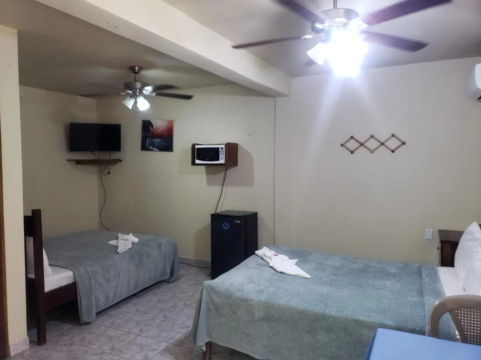 Bed in Beach Side Condos Caye Caulker by CCVH