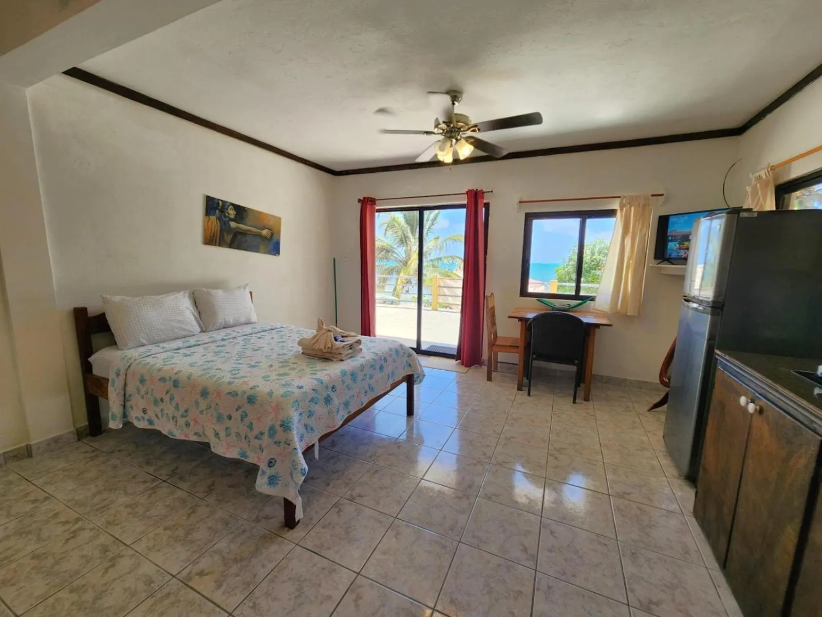 Bed in Beach Side Condos Caye Caulker by CCVH