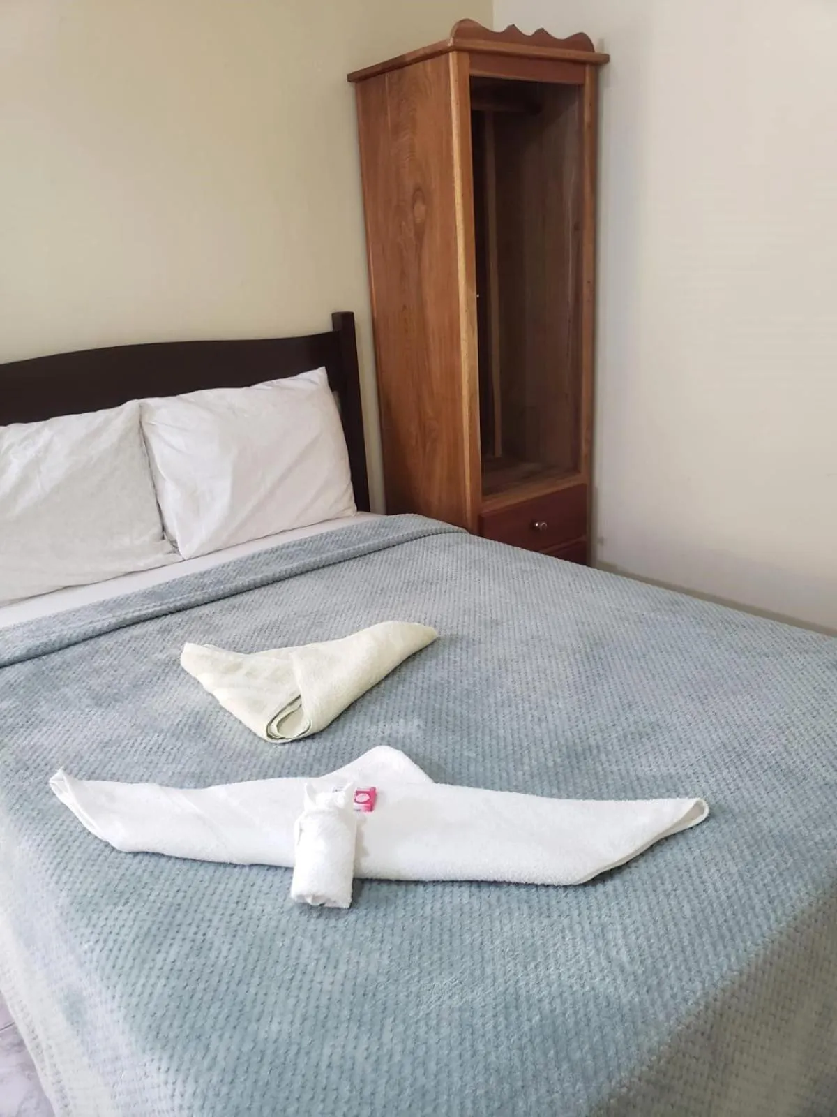 Bed in Beach Side Condos Caye Caulker by CCVH