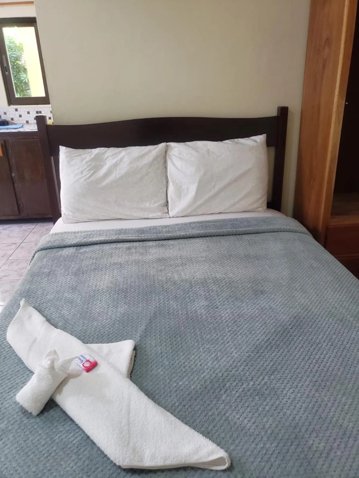 Bed in Beach Side Condos Caye Caulker by CCVH