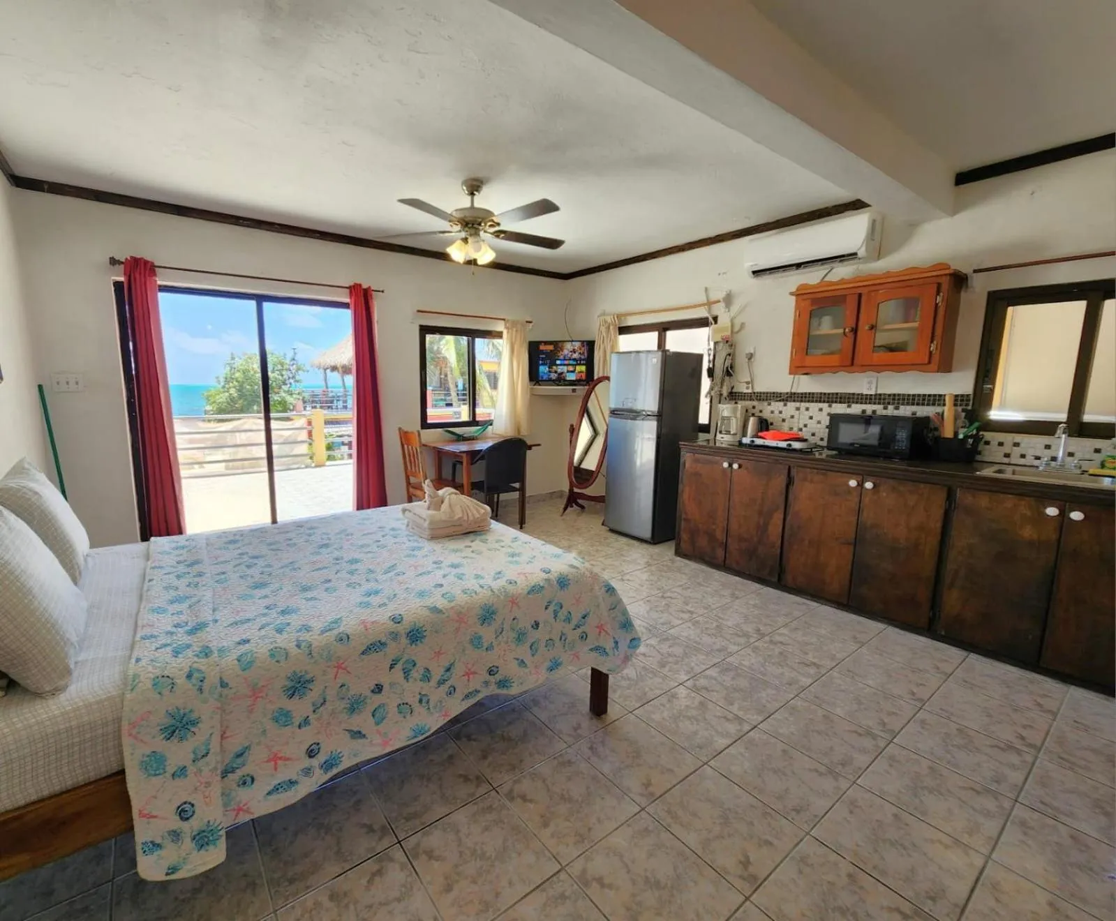 Bed in Beach Side Condos Caye Caulker by CCVH