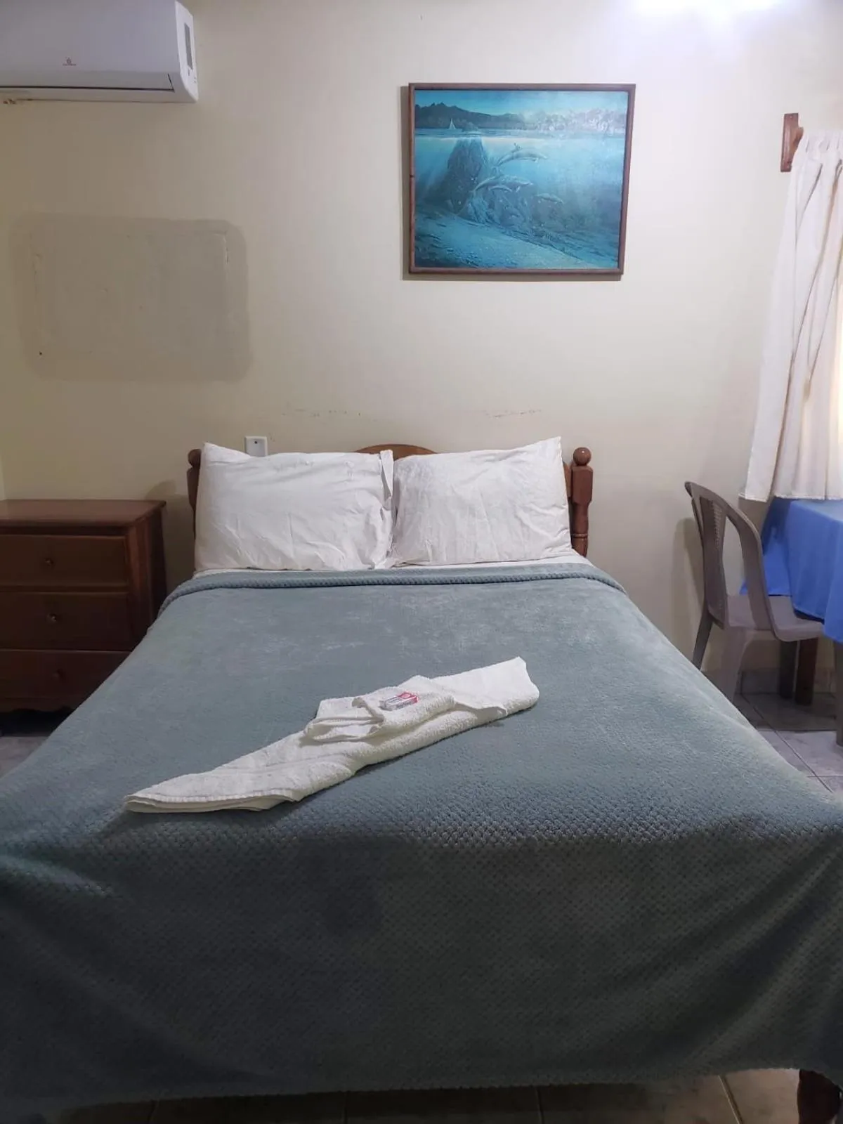 Bed in Beach Side Condos Caye Caulker by CCVH