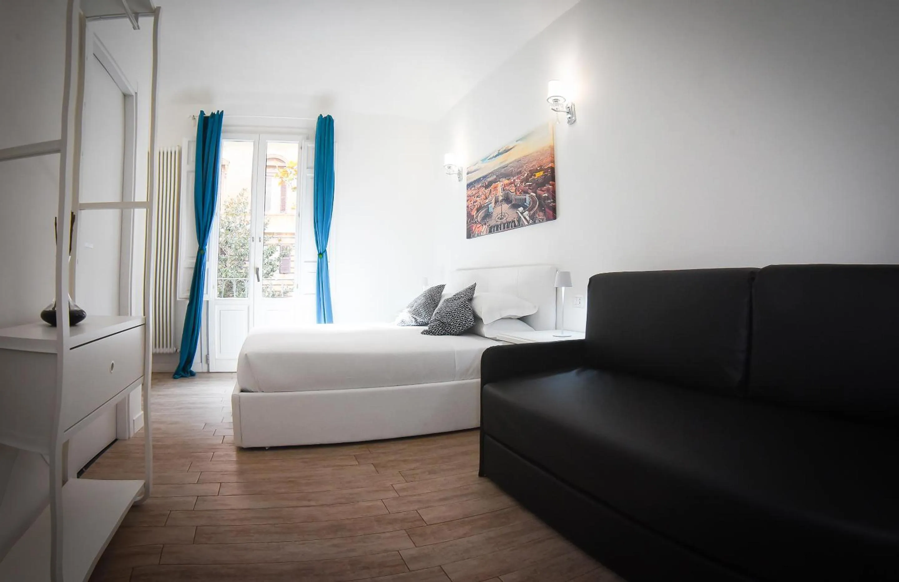 Bed in BQ House COLOSSEUM Luxury Rooms