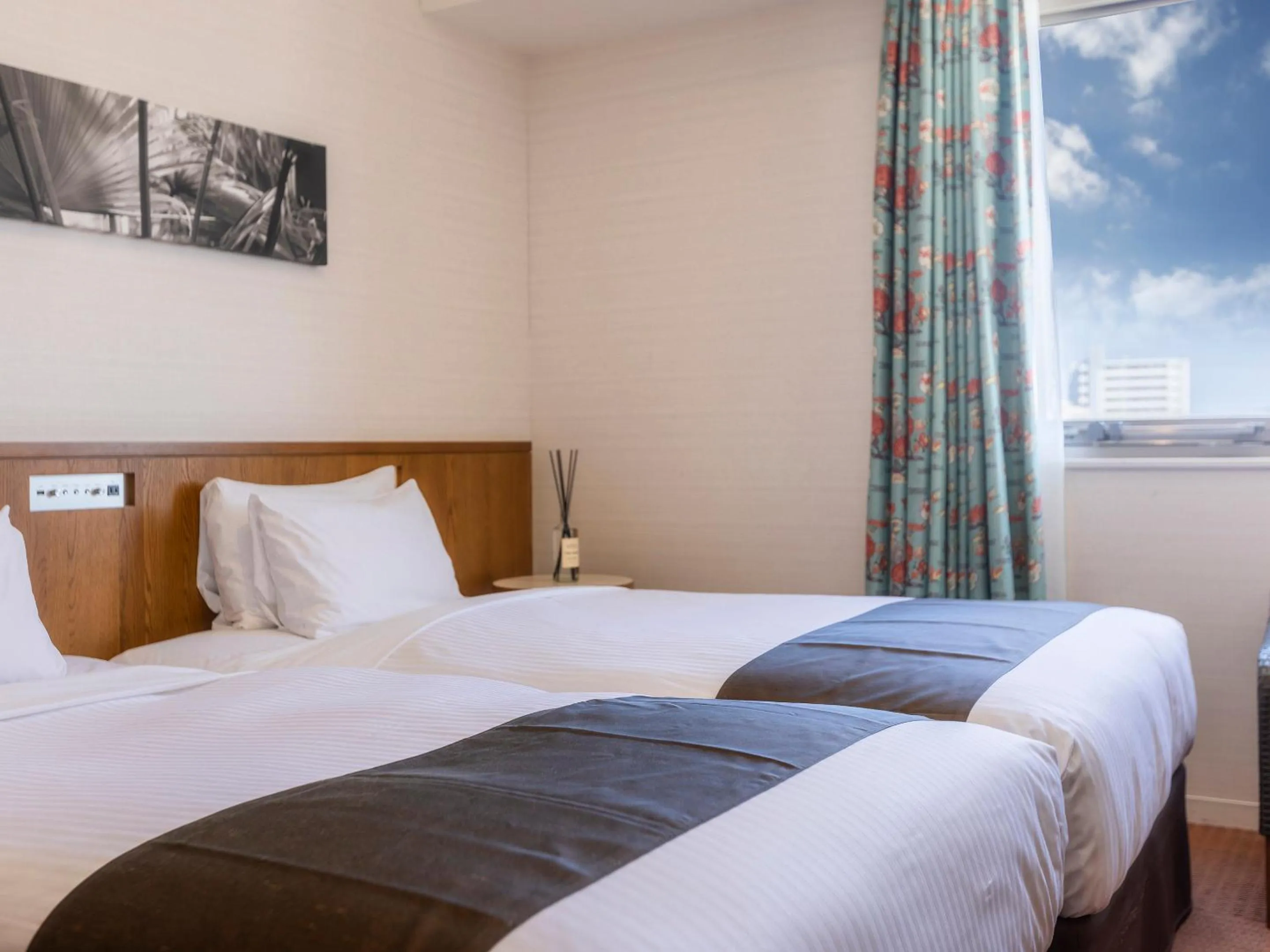 Bed in Hotel Gracery Naha