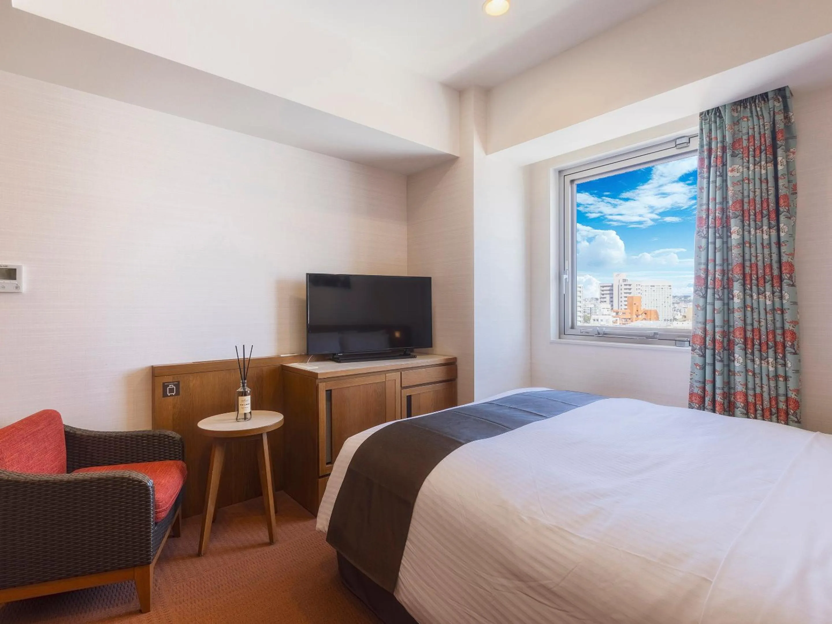 Bed in Hotel Gracery Naha