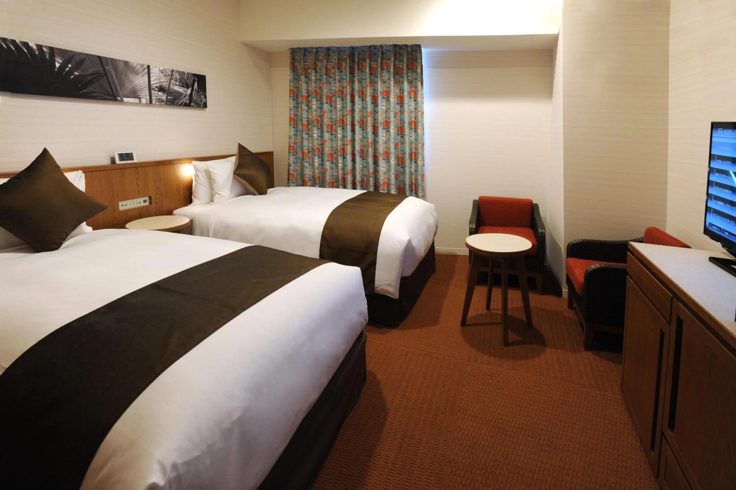 Photo of the whole room, Bed in Hotel Gracery Naha