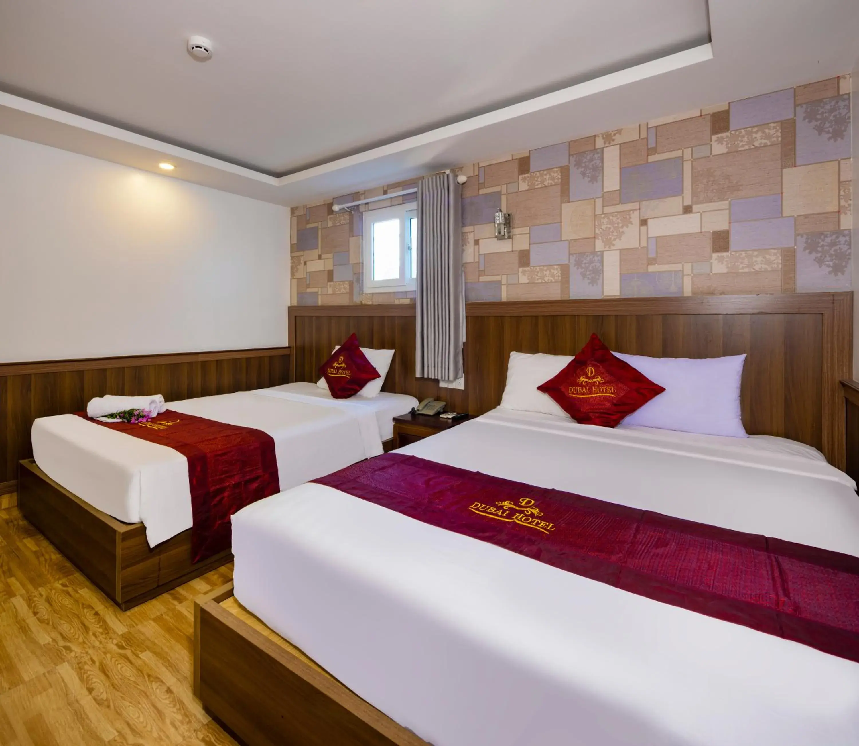 Deluxe Queen Room with Two Queen Beds in Dubai Nha Trang Hotel managed by HT Deluxe Queen Room with Two Queen Beds in Dubai Nha Trang Hotel managed by HT